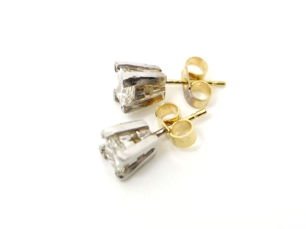 Super 18ct gold princess cut diamond stud earrings, each approximately 0.45ct (0.9ct total). With 18ct gold butterfly backs.