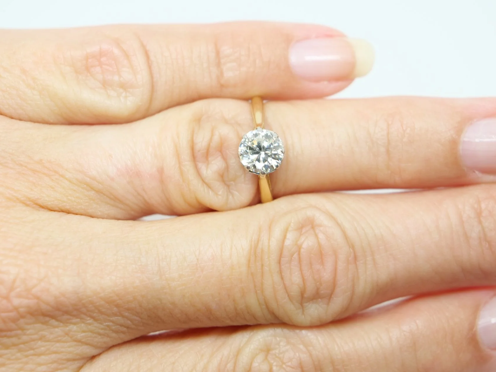 vintage 18ct gold and platinum diamond solitaire ring, round brilliant cut