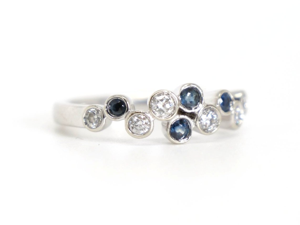 Unusual contemporary 9ct gold sapphire and diamond bubble style ring, set with four sapphires and six diamonds.
