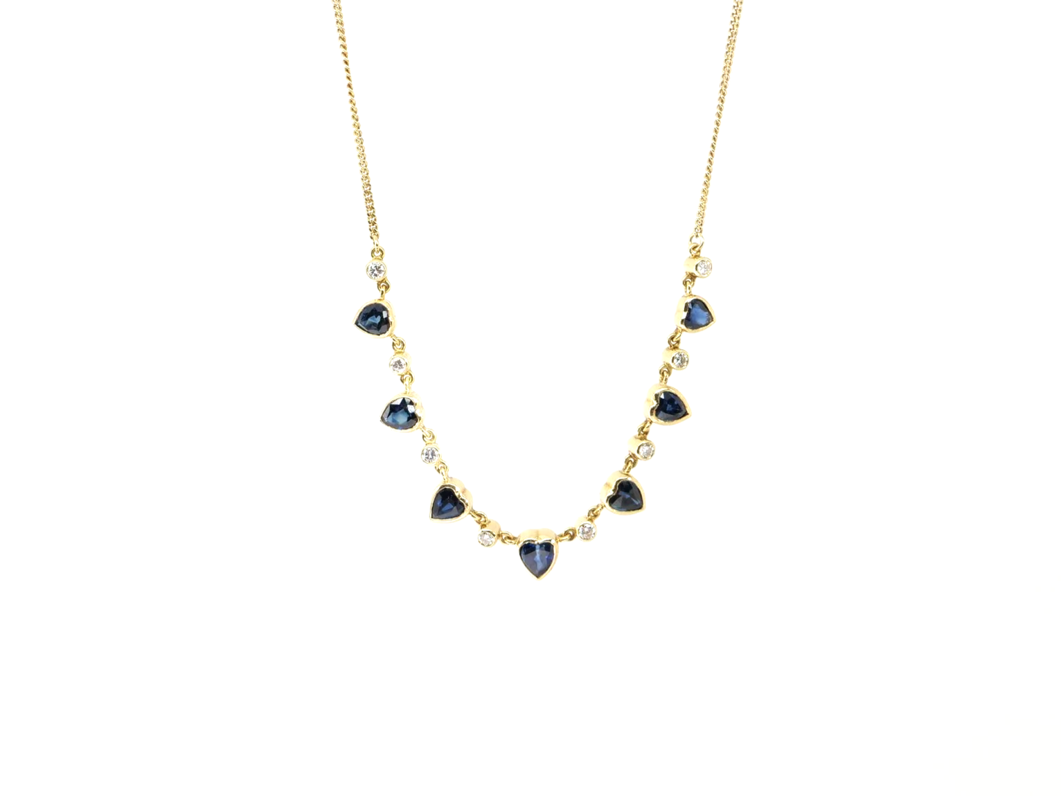 Unusual vintage 18ct gold sapphire heart and diamond necklace.