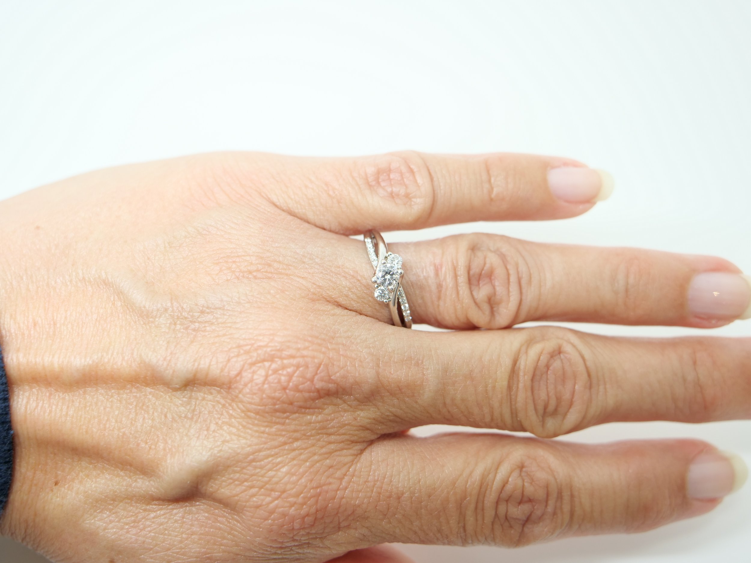 platinum diamond three-stone twist ring
