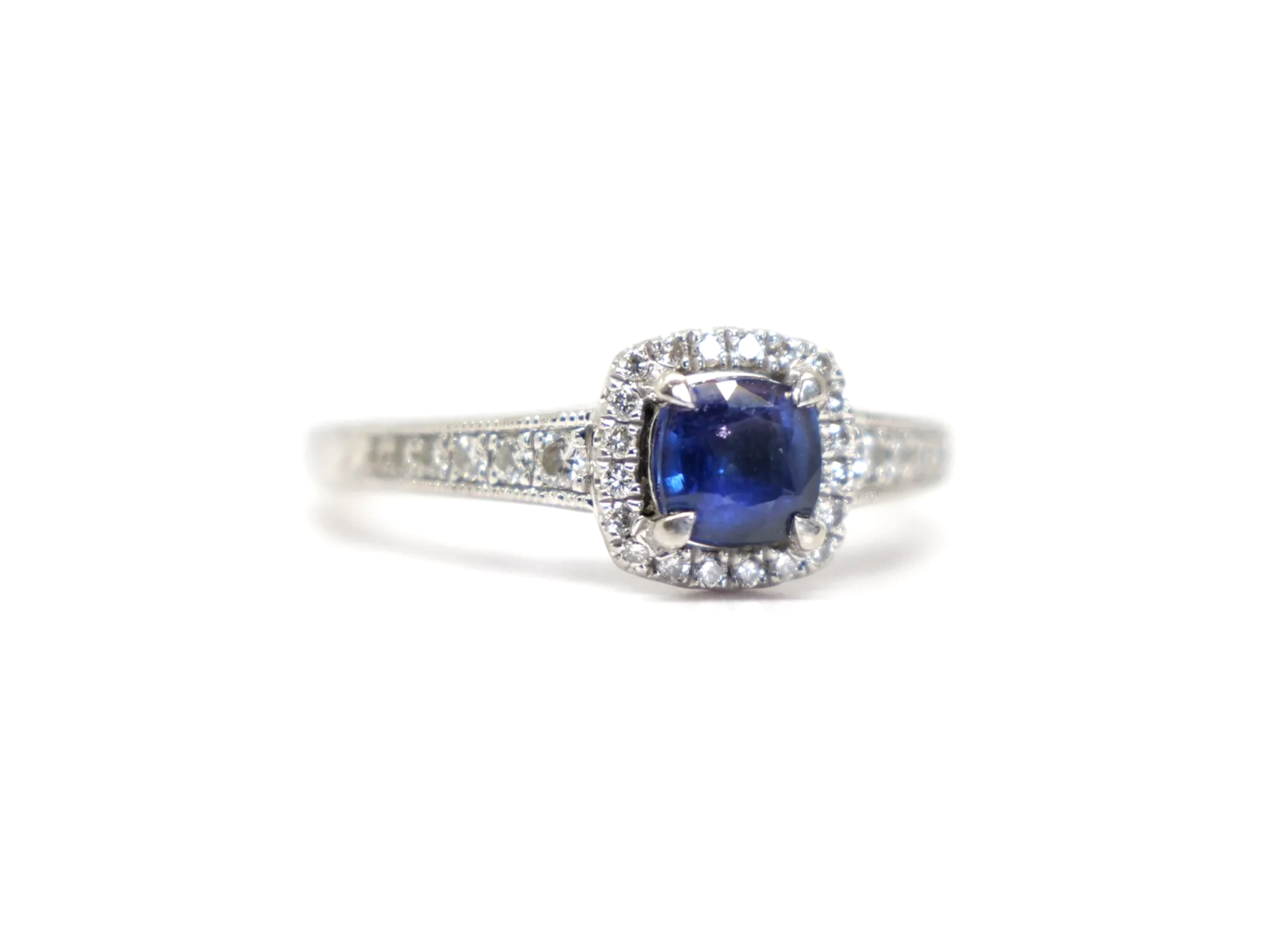 platinum sapphire and diamond halo ring vintage design