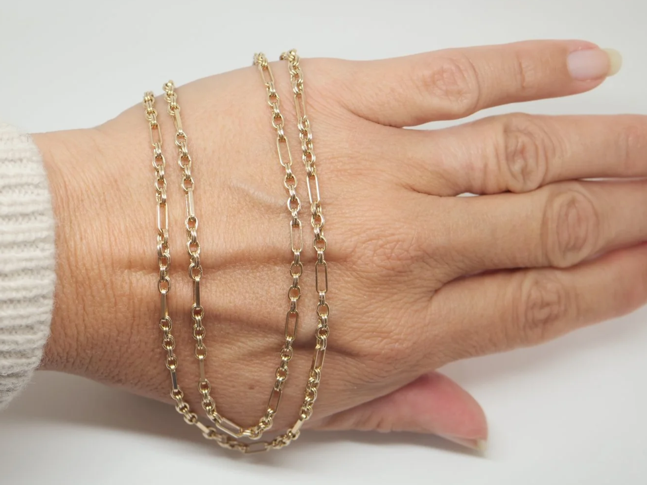 9ct gold Figaro chain with alternating belcher and bar links, 24 inches