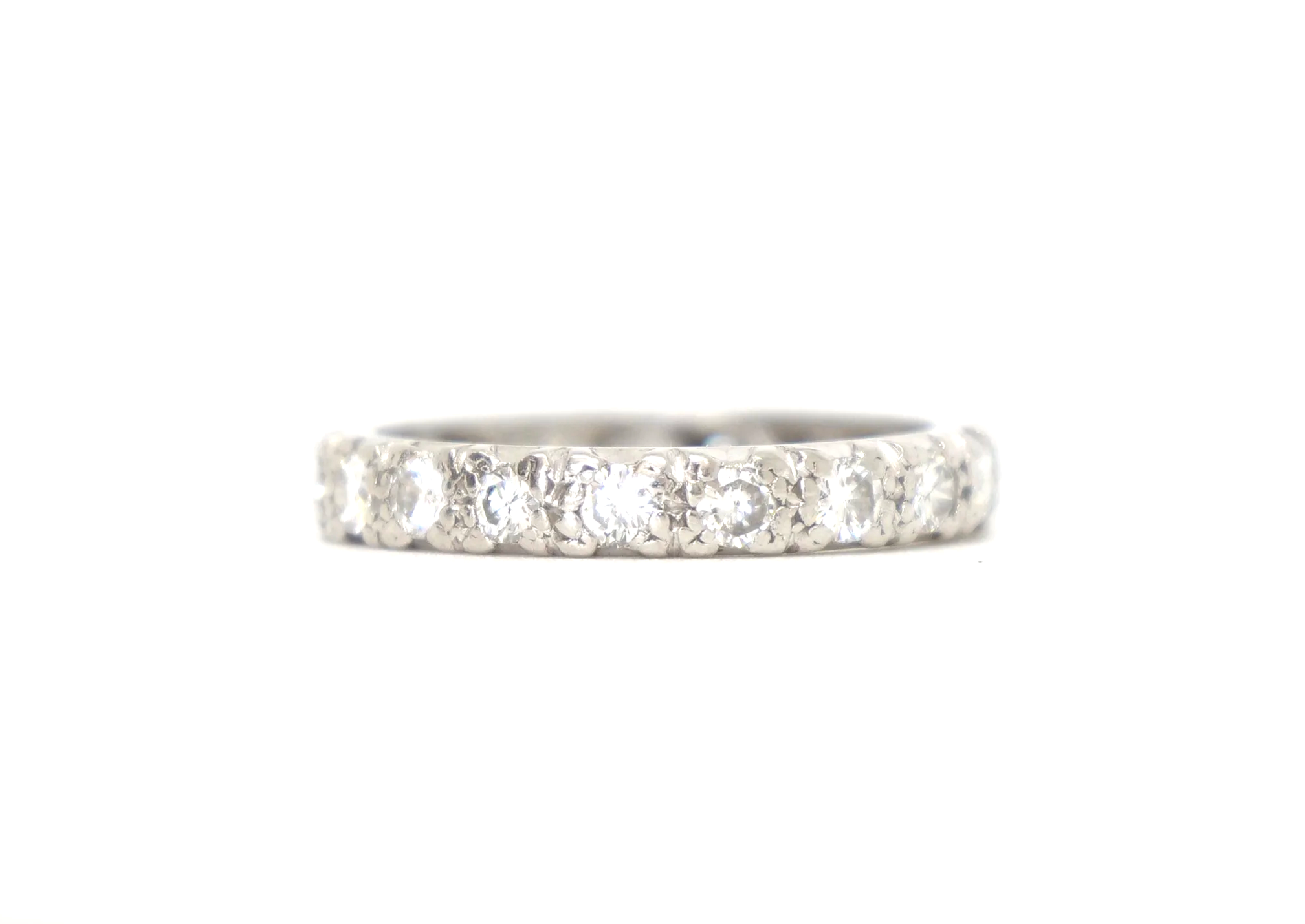A platinum full eternity ring set with round brilliant cut diamonds all the way around the band — 1.5 carats