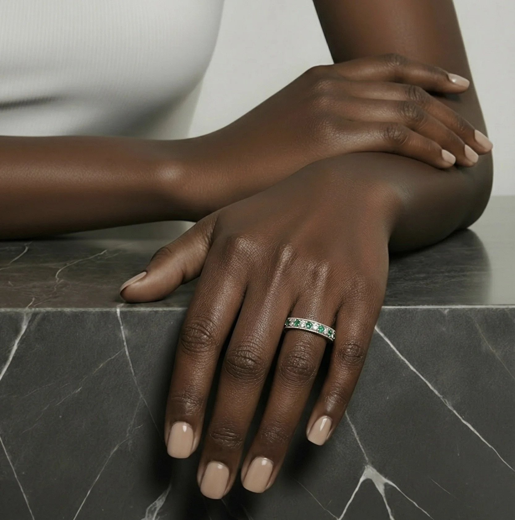 Very pretty 18ct gold emerald and diamond half eternity ring, set with seven emeralds and six diamonds.