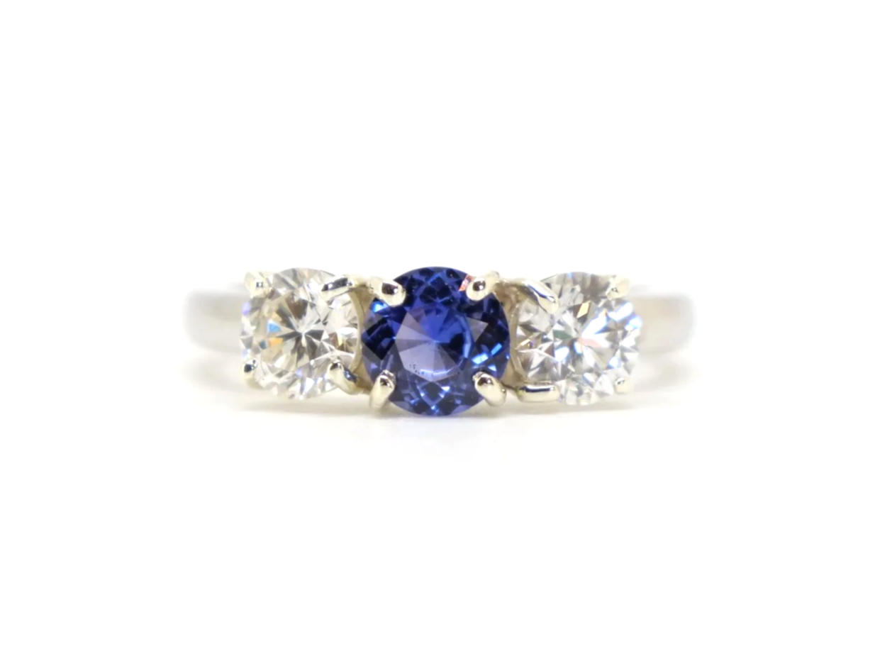 Platinum sapphire and diamond three stone ring, round cut sapphire centre 1.8ct
