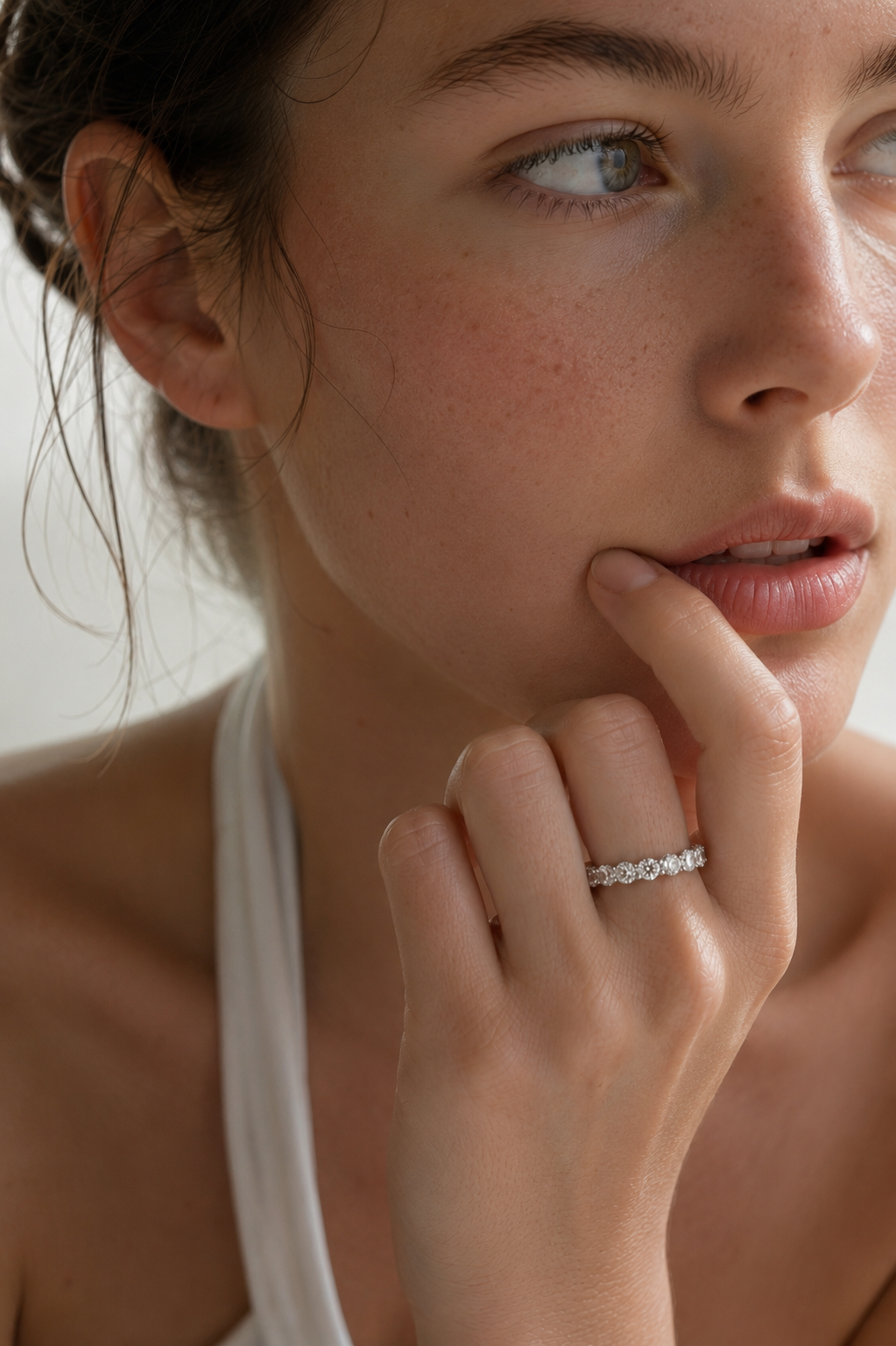 platinum diamond half-eternity ring set with seven round brilliant-cut diamonds