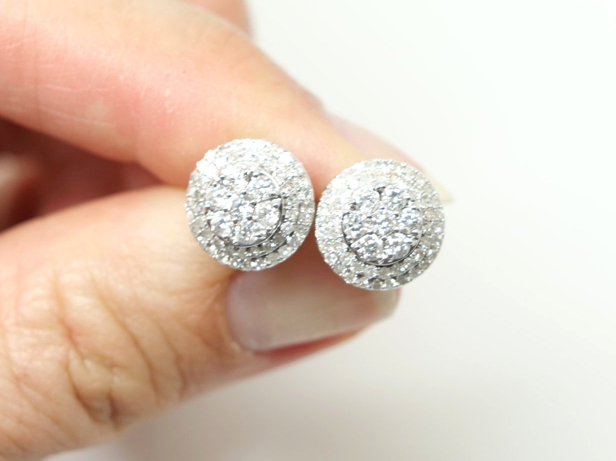 Super 18ct gold sparkly diamond cluster earrings, each set with a central diamond cluster and then two rows. of diamonds.
