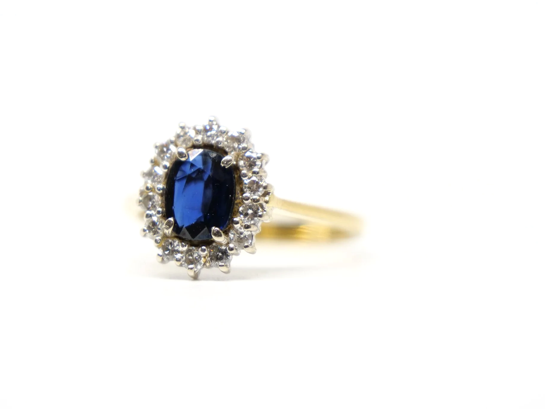 Classic 18ct yellow gold sapphire and diamond cluster ring