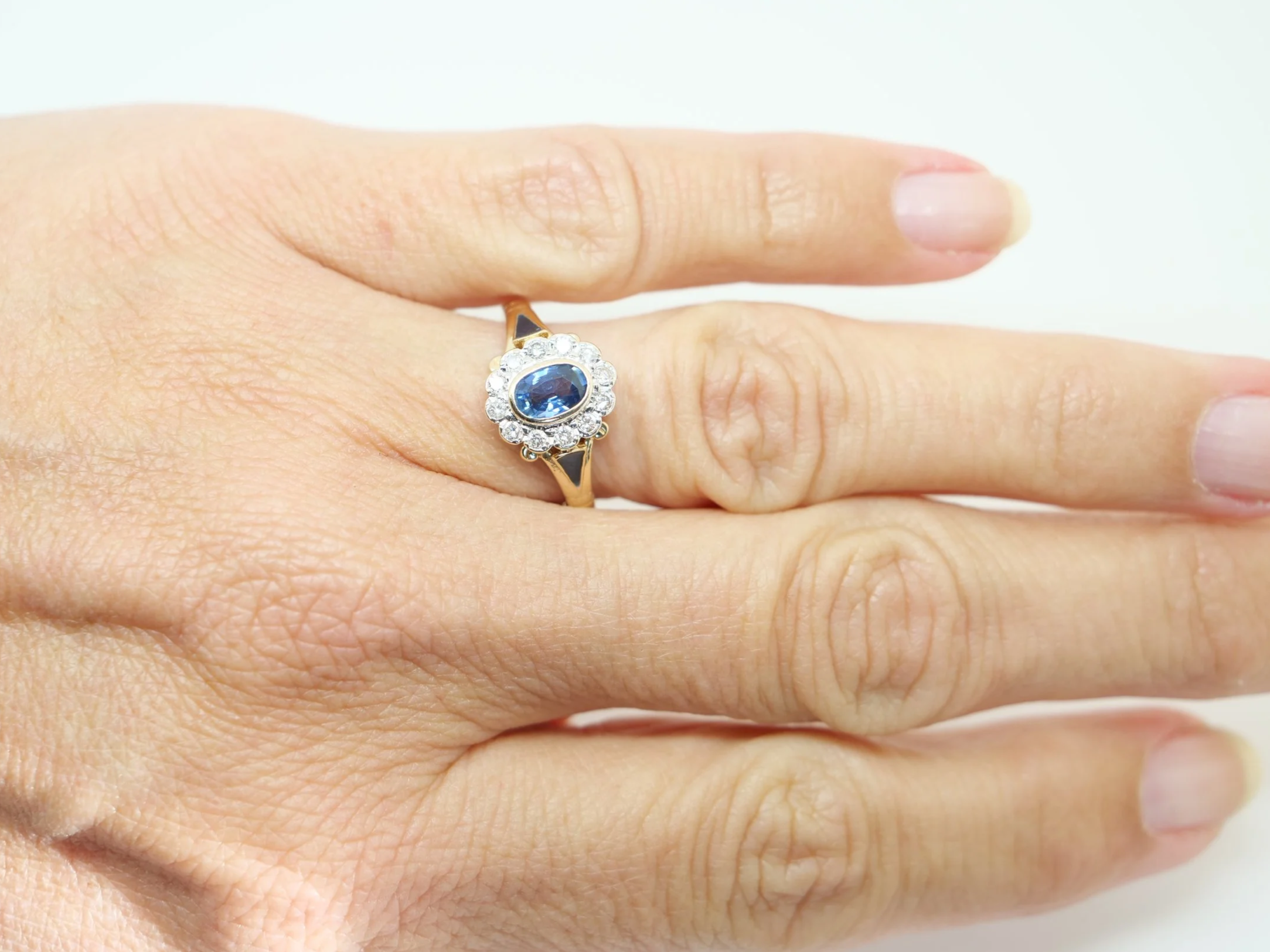 14ct gold sapphire and diamond cluster ring with blue enamel detail