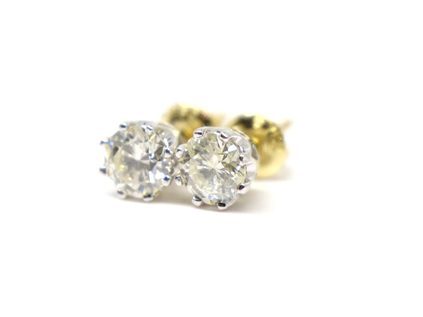 Lovely pair of 18ct white gold diamond stud earrings, each set with a round brilliant cut diamond of approximately 0.85 carats.