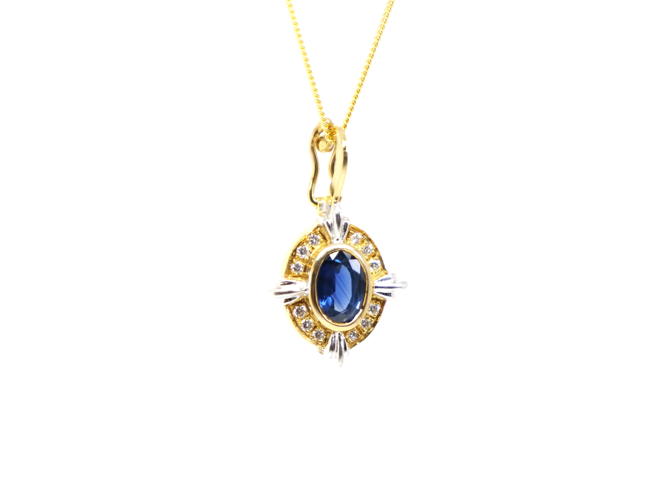 Super 18ct gold vintage 1ct sapphire and diamond pendant and chain.