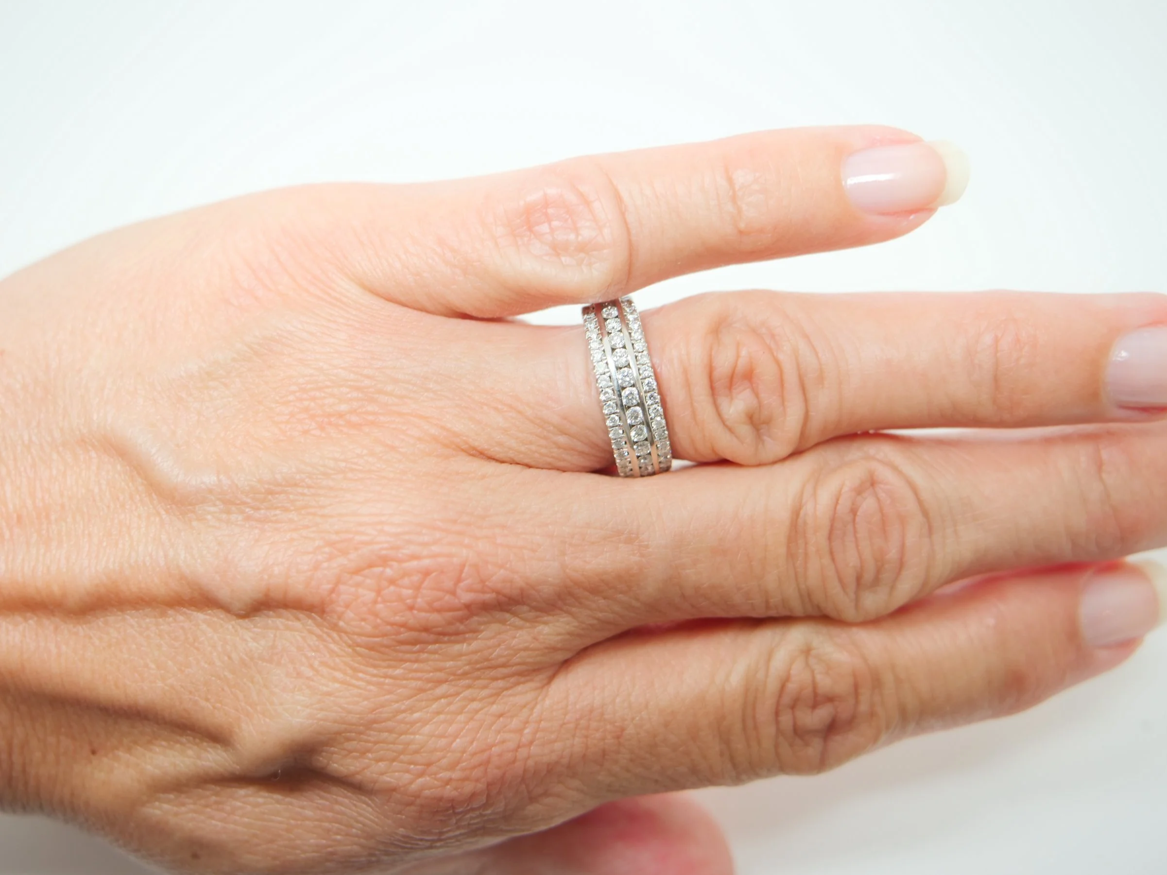 9ct white gold triple row diamond half eternity ring