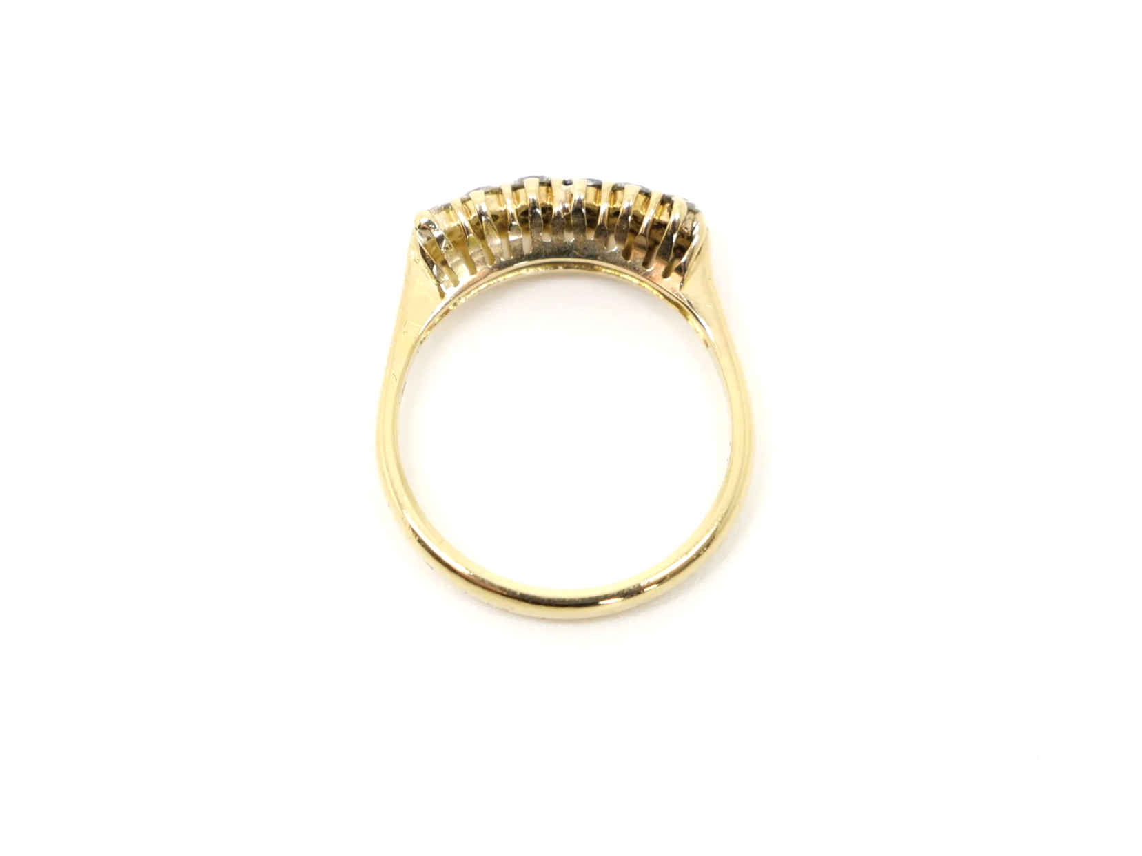 A double row diamond ring in 18ct yellow gold — fourteen round brilliant cut diamonds arranged in two parallel rows, totalling approximately 1.2 carats