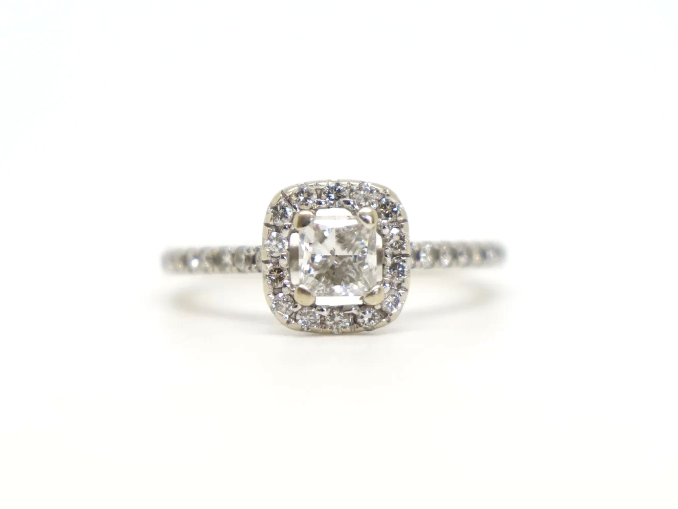 9ct white gold princess cut diamond halo ring, central square princess cut diamond in a diamond halo with diamond set shoulders