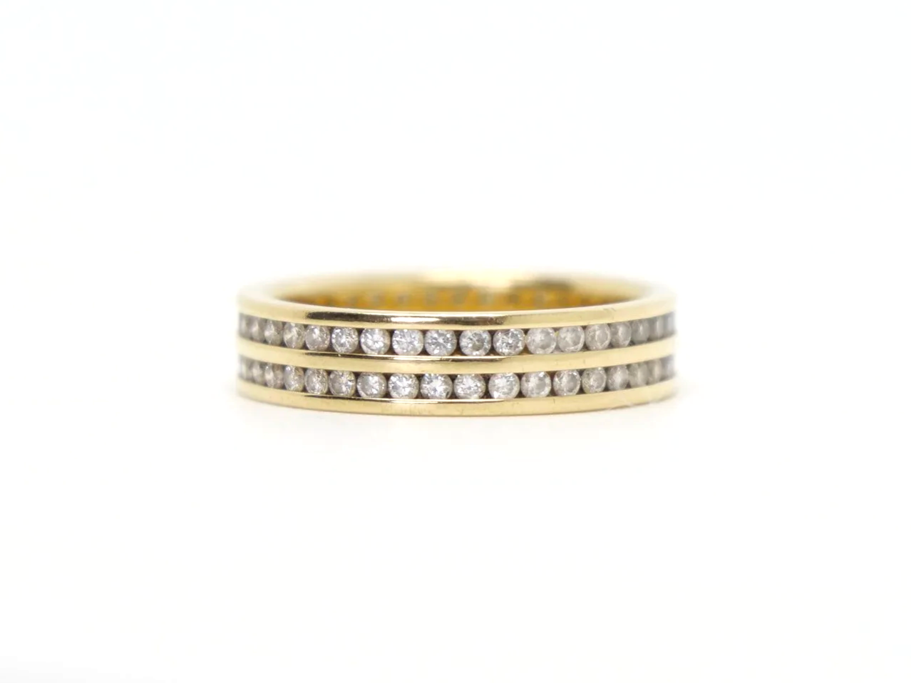 Beautiful 18ct gold double row diamond full eternity ring, set with approximately 1.2ct brilliant cut diamonds.
