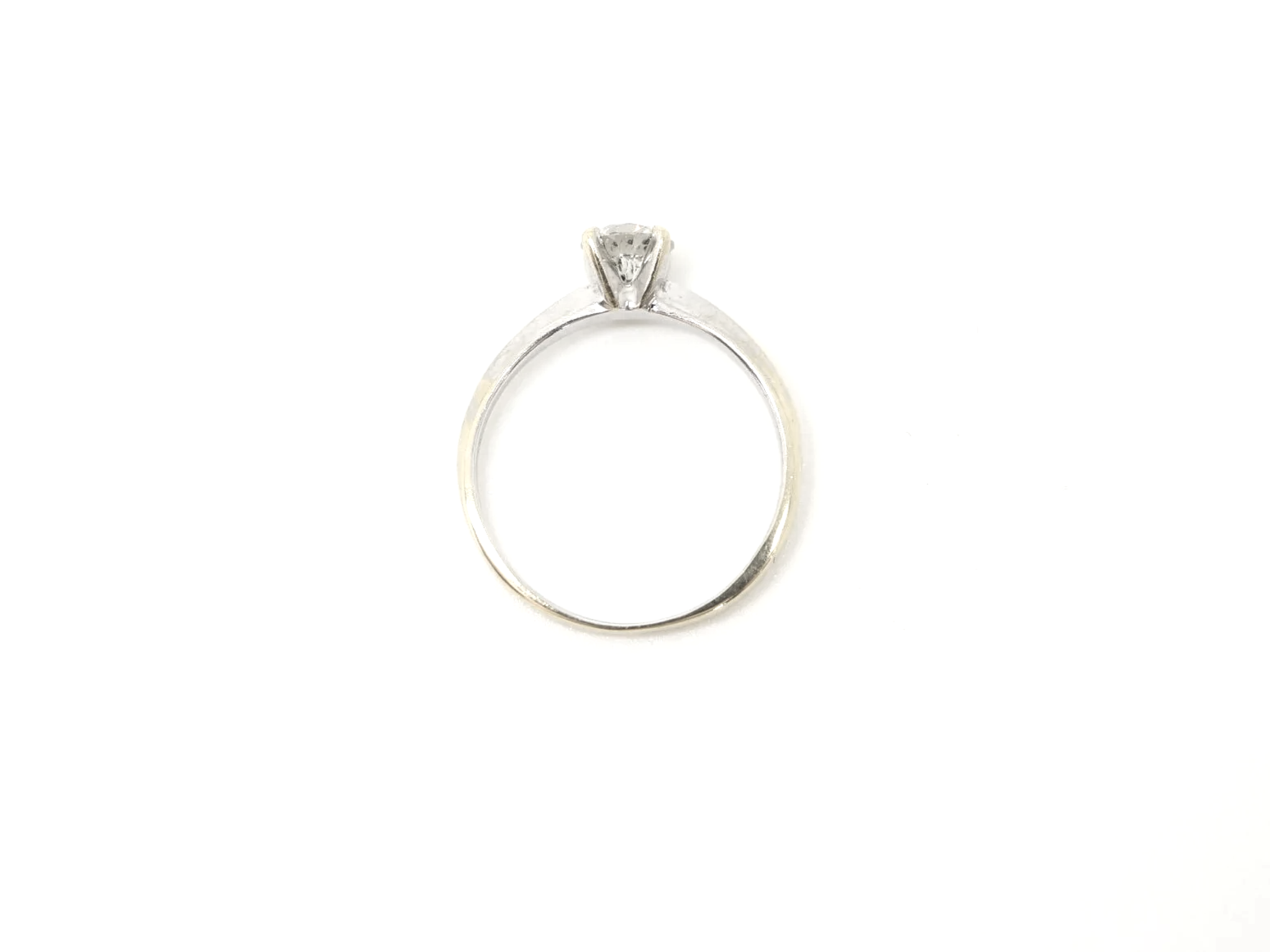 A clean, classic diamond solitaire in 14ct gold with a 0.5ct diamond