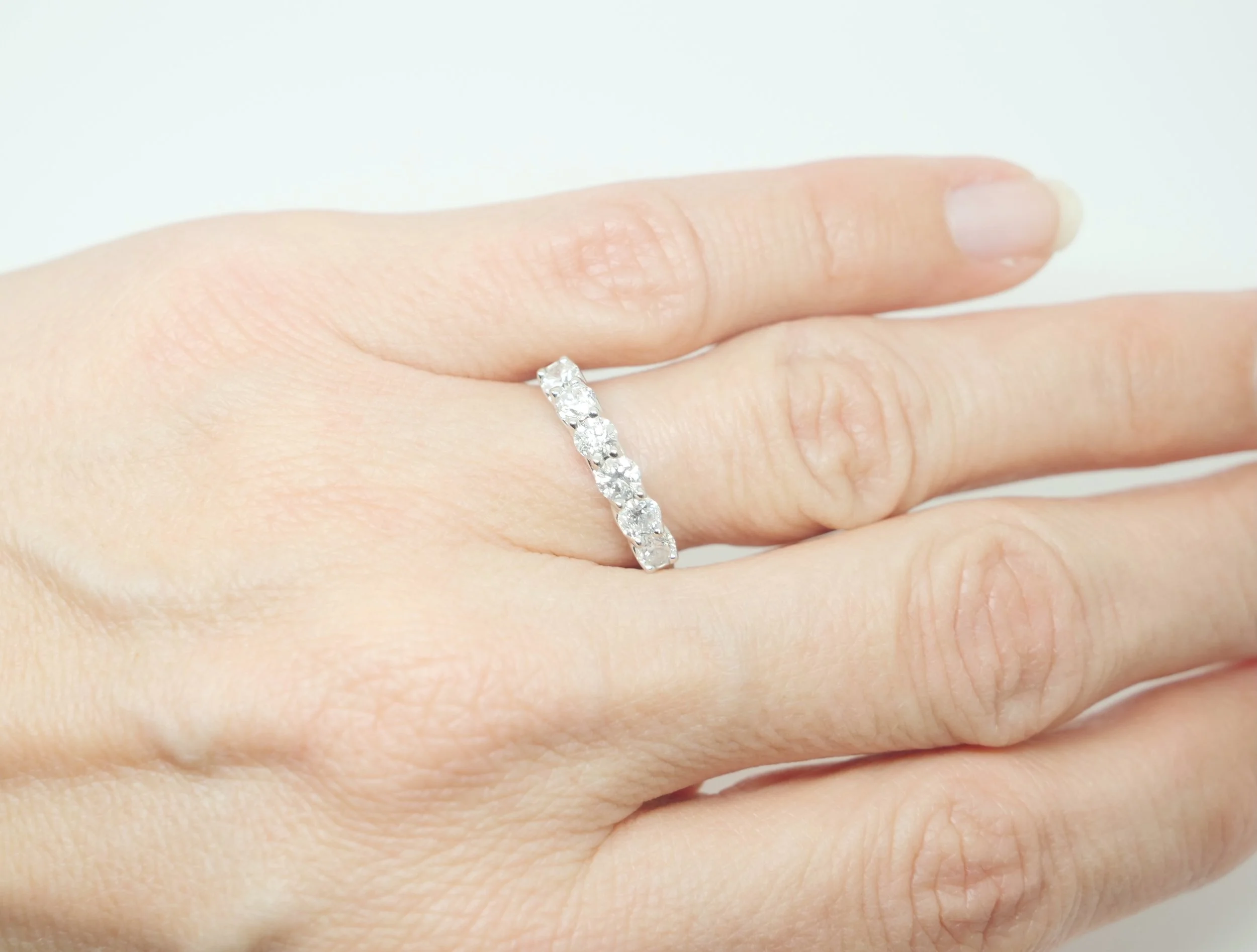 Classic platinum diamond half eternity ring, set with six brilliant cut diamonds with a total diamond weight of 1ct.