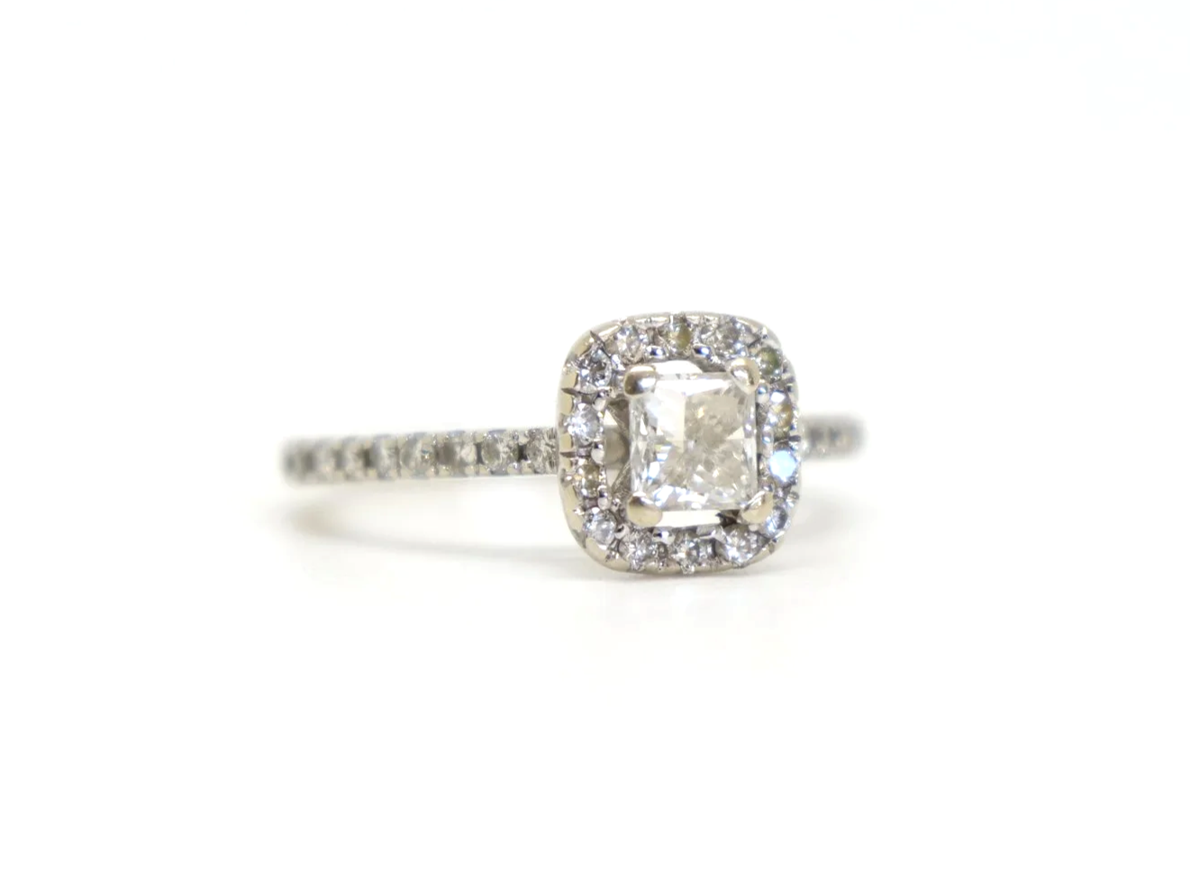9ct white gold princess cut diamond halo ring, central square princess cut diamond in a diamond halo with diamond set shoulders