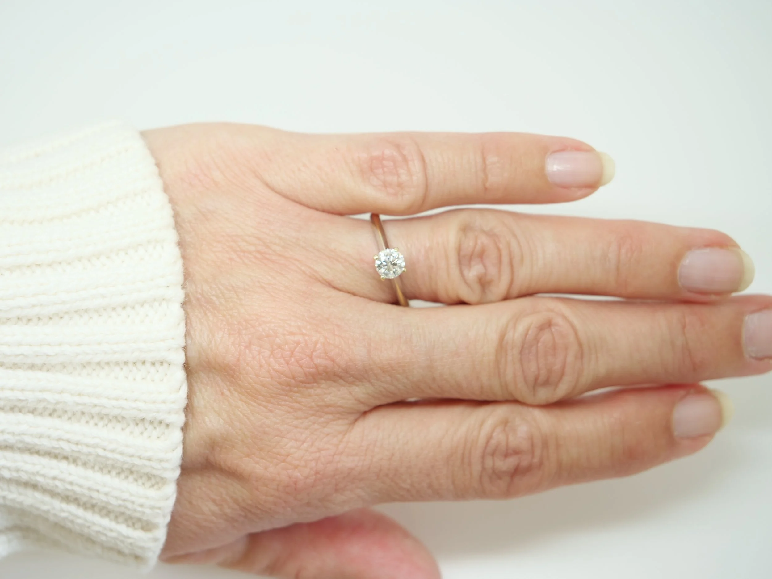 A clean, classic diamond solitaire in 14ct gold with a 0.5ct diamond