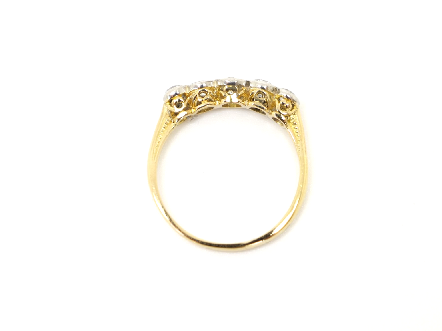 Gorgeous vintage 18ct gold and platinum five stone ring, set with five well matched old cut diamonds. Approximately 0.8cts total diamond weight.