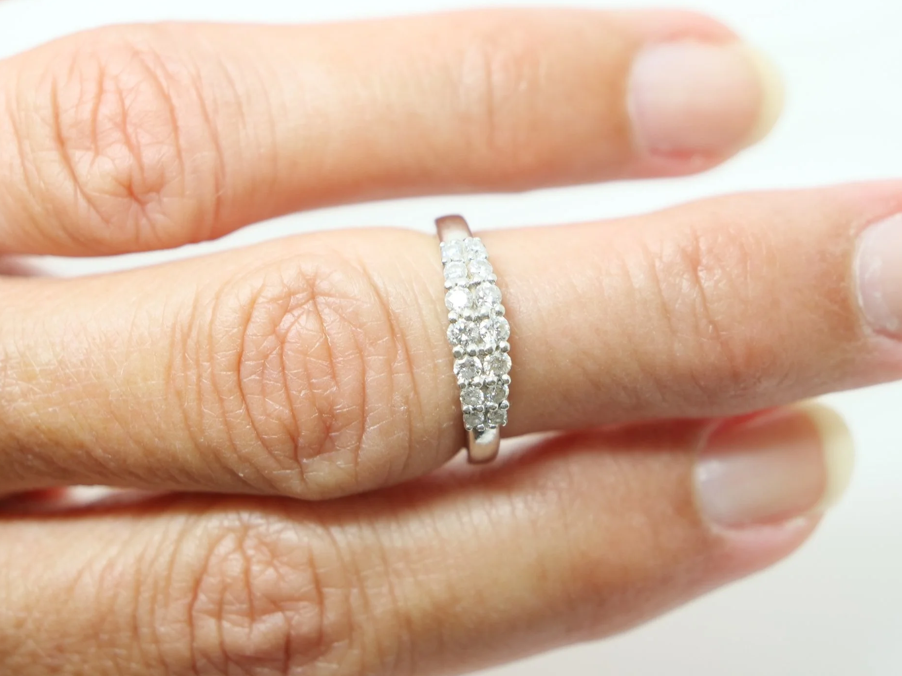 Lovely 18ct gold diamond half eternity ring, set with two rows of graduated diamonds. Approximately 0.34ct diamonds total.