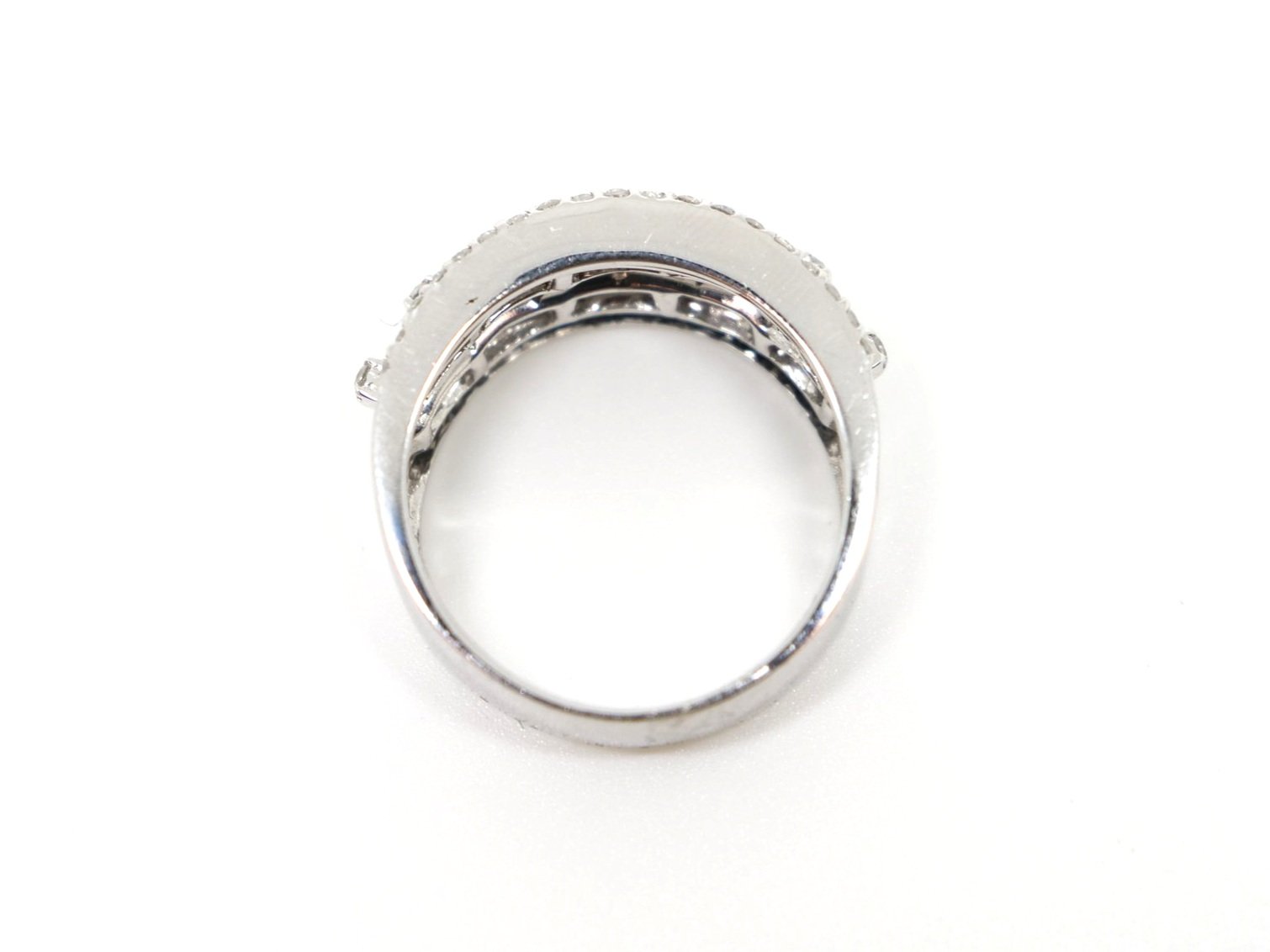 Contemporary 18ct gold diamond statement ring, set with a mixture of both brilliant and baguette cut diamonds. 1.88cts of diamonds.