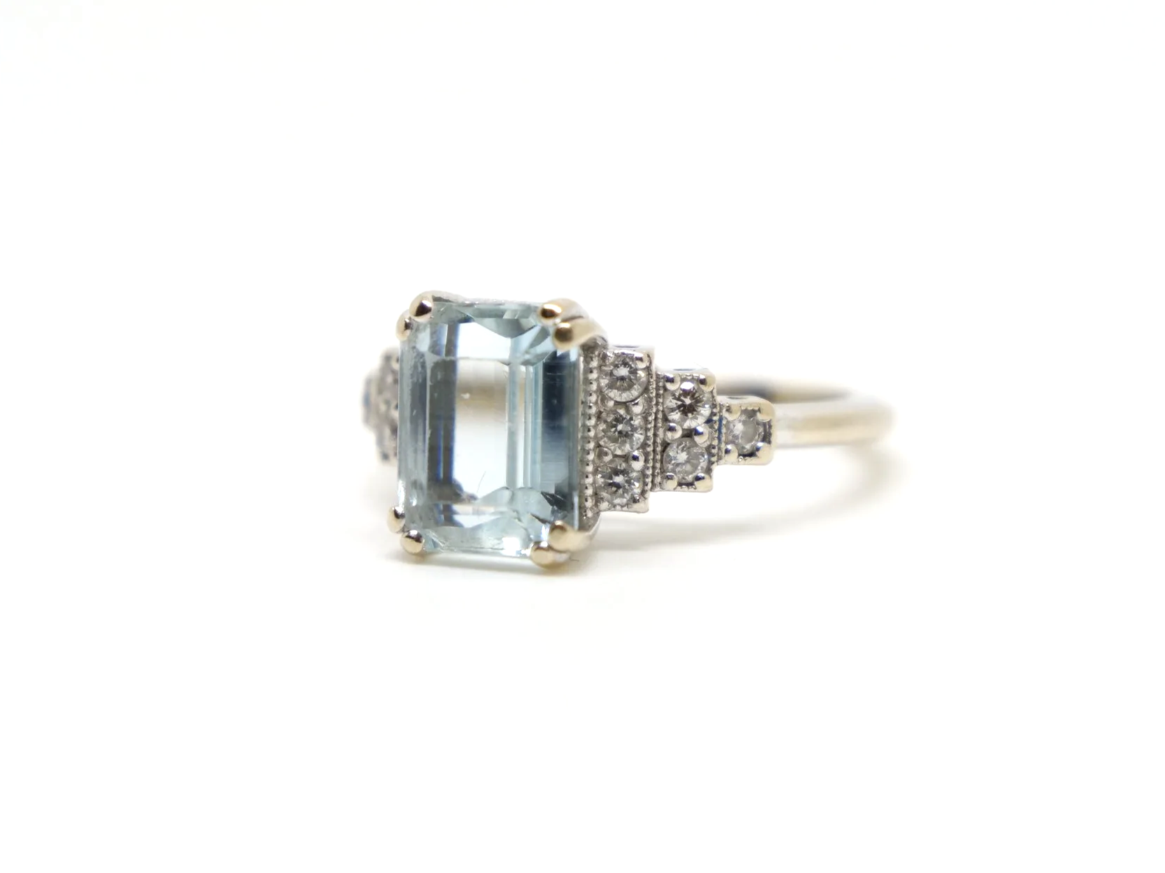 18ct white gold aquamarine and diamond ring, emerald cut centre stone