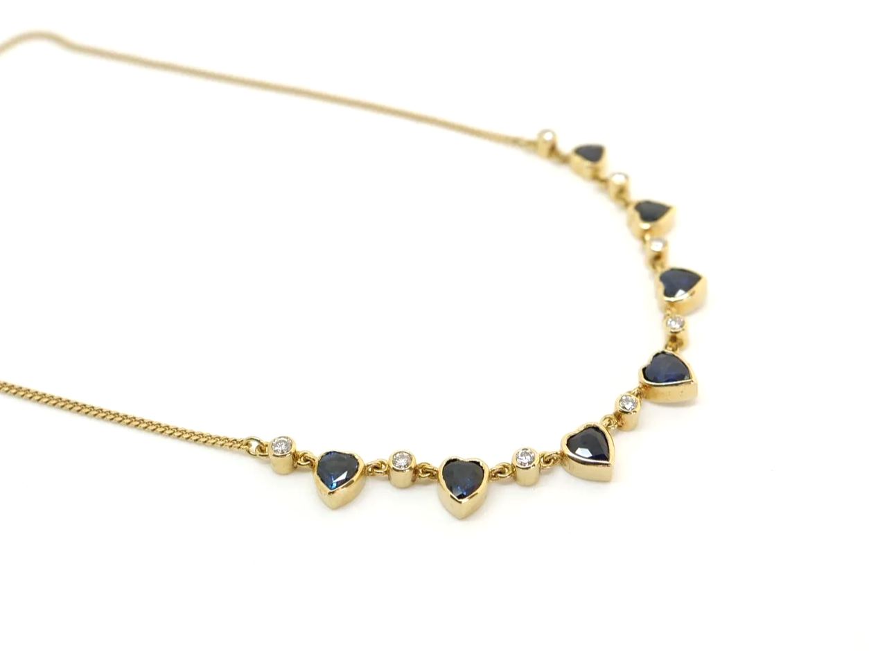 Unusual vintage 18ct gold sapphire heart and diamond necklace.
