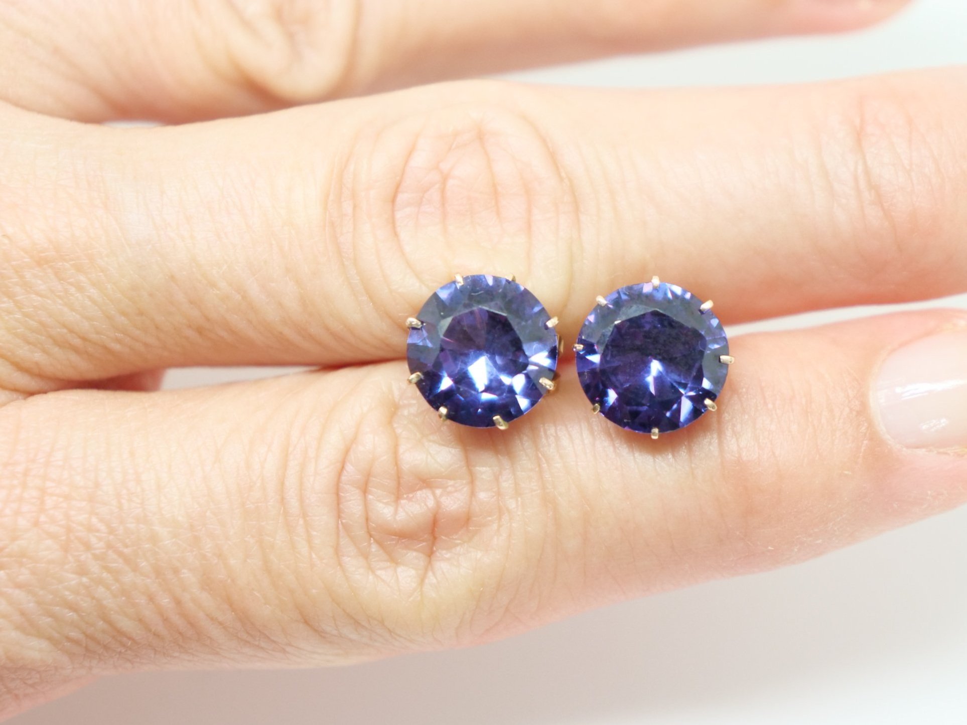 Fabulous 14ct gold vintage stud earrings, set with large created colour change sapphires. Wonderful colour difference in different lights.