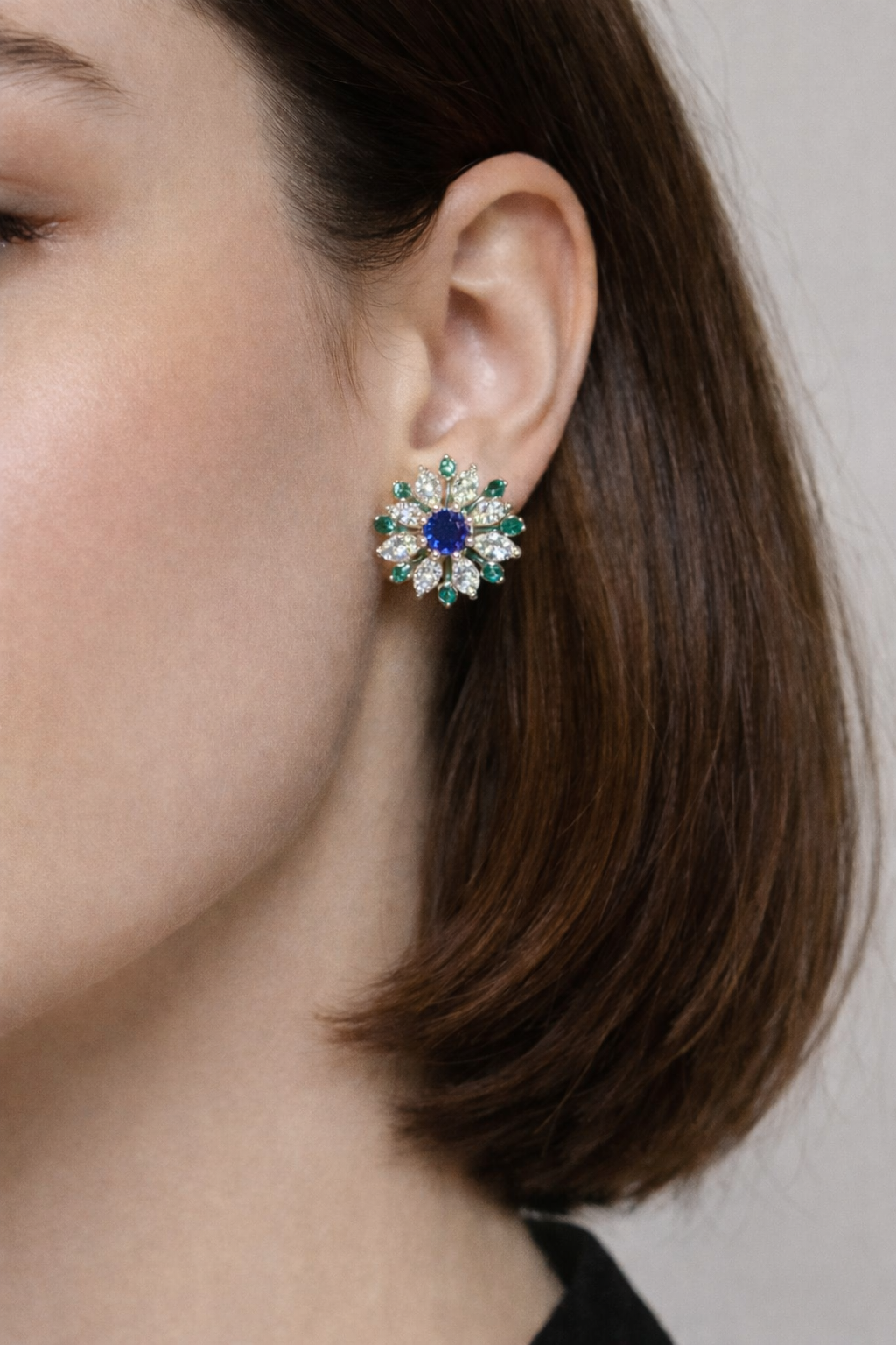 platinum emerald diamond sapphire earrings.png