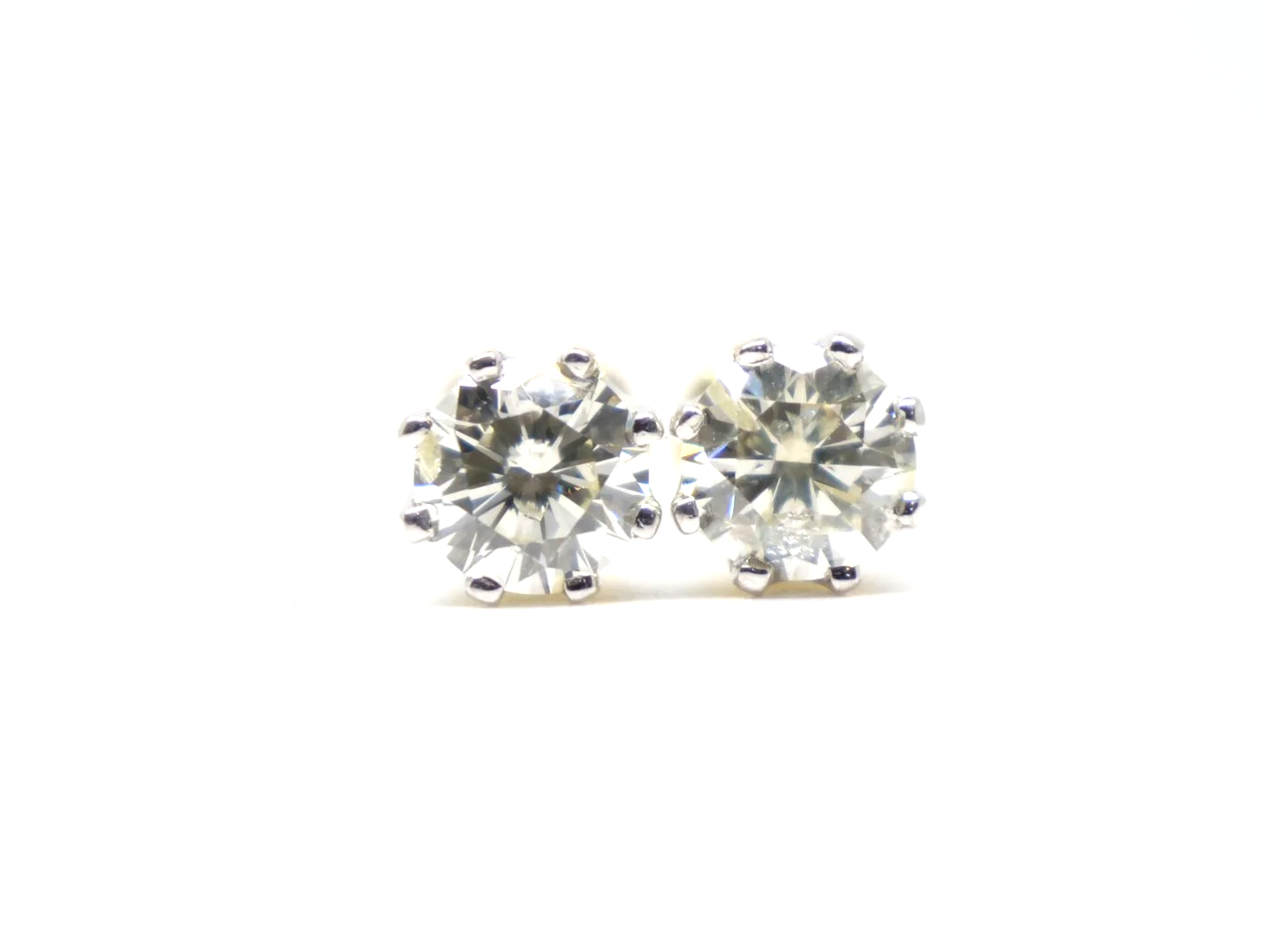Lovely pair of 18ct white gold diamond stud earrings, each set with a round brilliant cut diamond of approximately 0.85 carats.