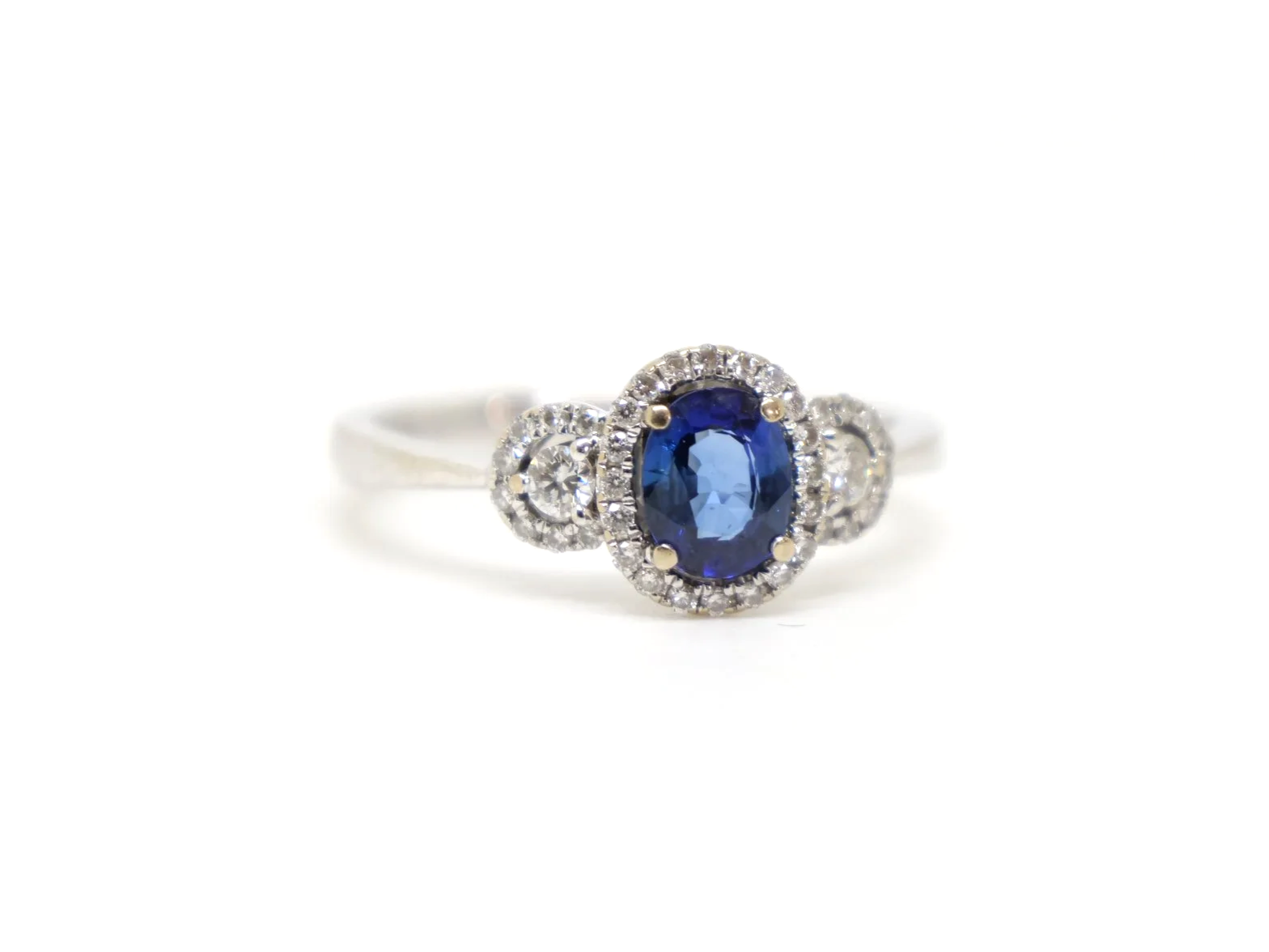 18ct gold sapphire and diamond halo cluster ring