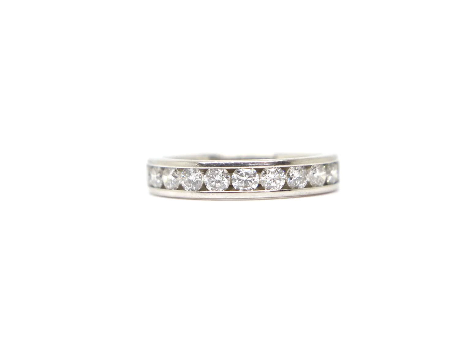 platinum channel-set diamond half eternity ring set