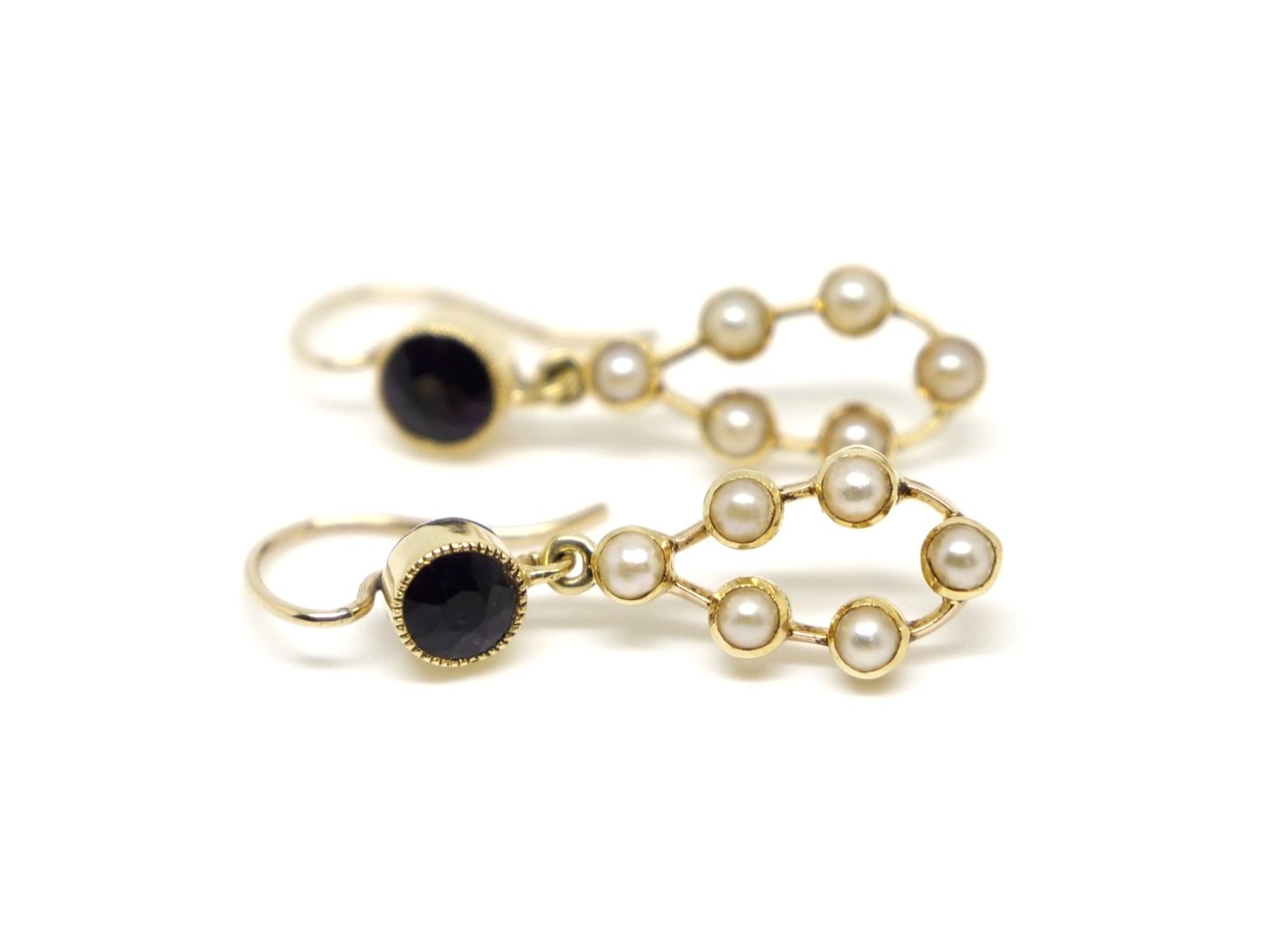 Lovely vintage 15ct gold earrings, each with a round cut deep purple amethyst with six seed pearls in a drop setting. With 9ct gold hoops.