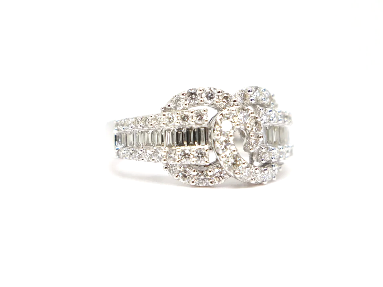 platinum diamond statement ring set with a combination of round brilliant and baguette cut diamonds totalling 1.258 carats.