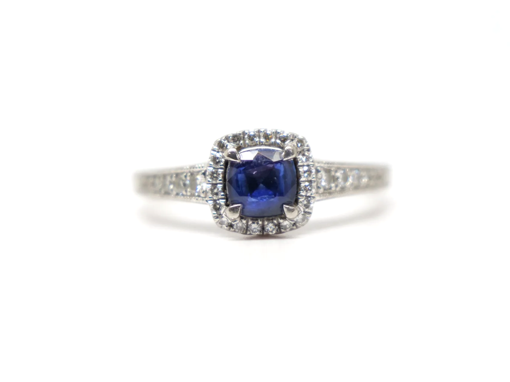platinum sapphire and diamond halo ring vintage design