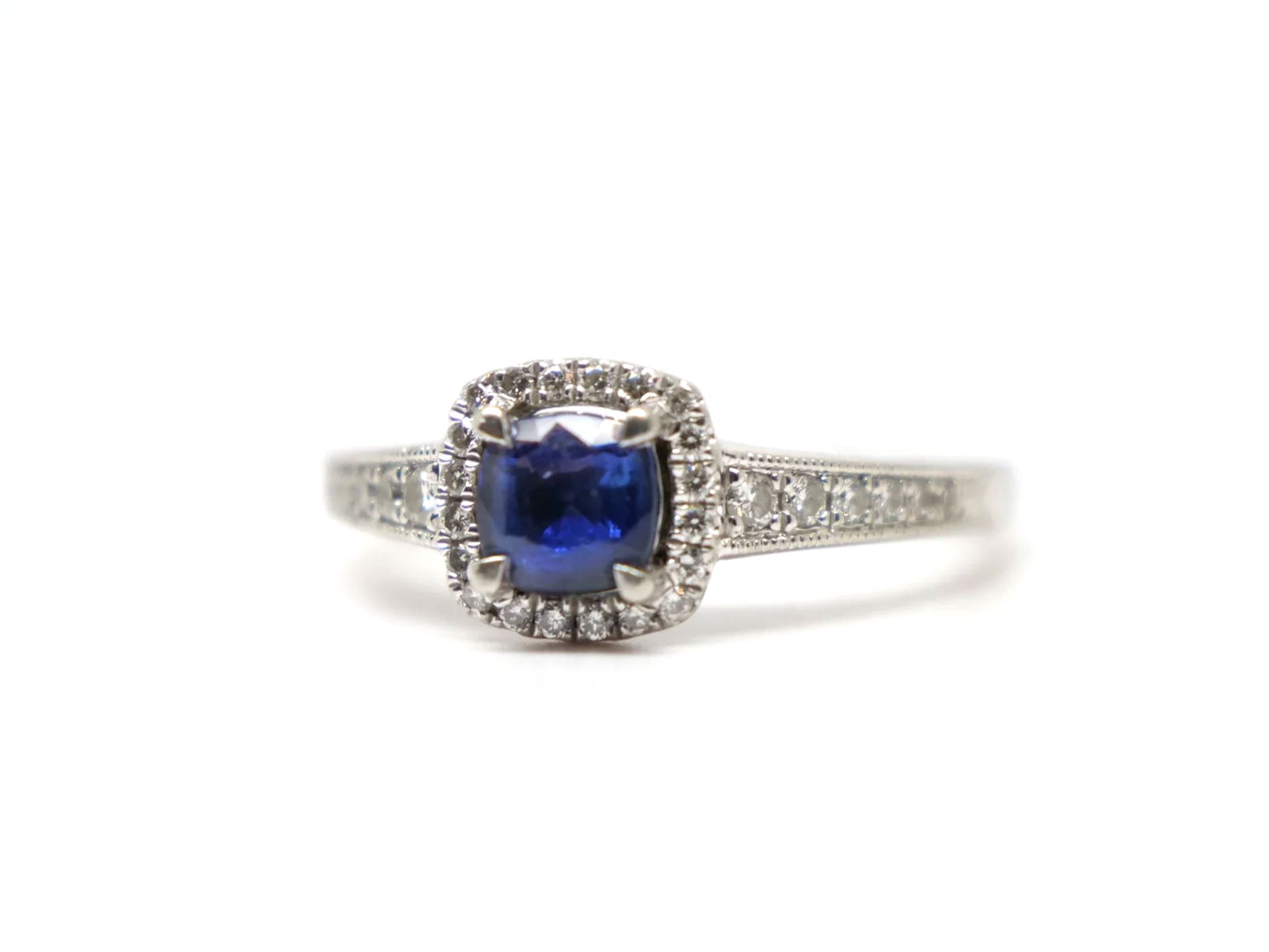 platinum sapphire and diamond halo ring vintage design