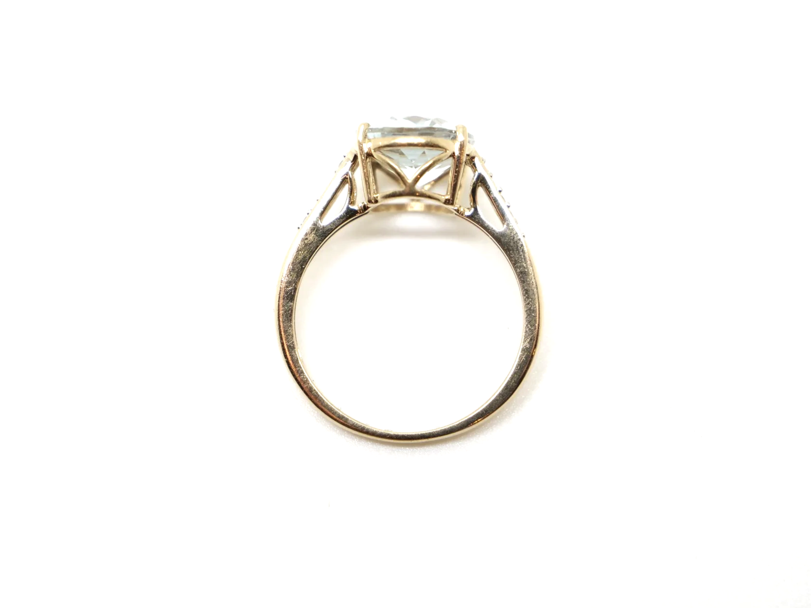 Lovely 10ct gold aquamarine and diamond cocktail ring, set with a large oval cut aquamarine with small diamonds to each shoulder.