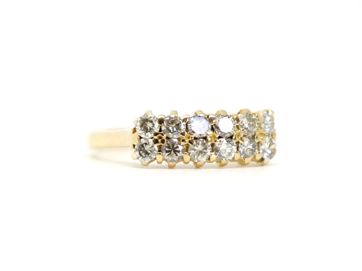 A double row diamond ring in 18ct yellow gold — fourteen round brilliant cut diamonds arranged in two parallel rows, totalling approximately 1.2 carats
