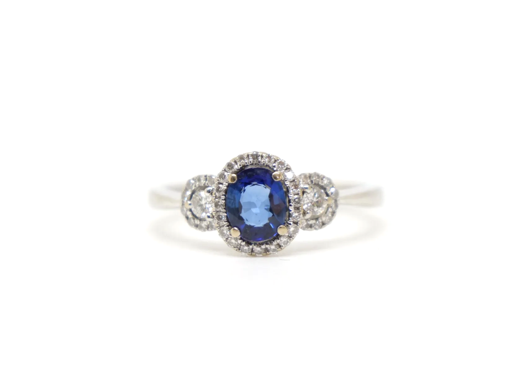 18ct gold sapphire and diamond halo cluster ring