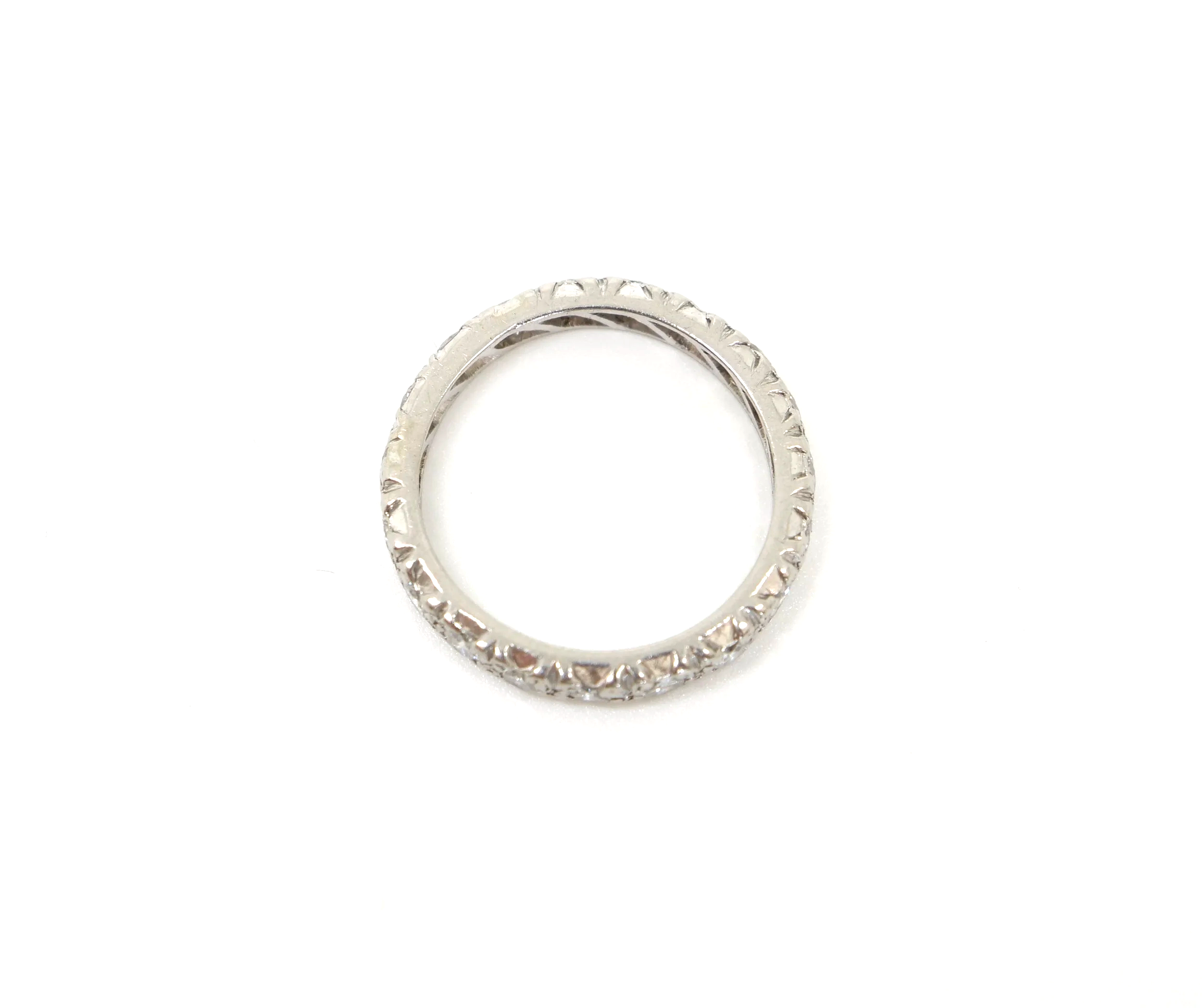 A platinum full eternity ring set with round brilliant cut diamonds all the way around the band — 1.5 carats