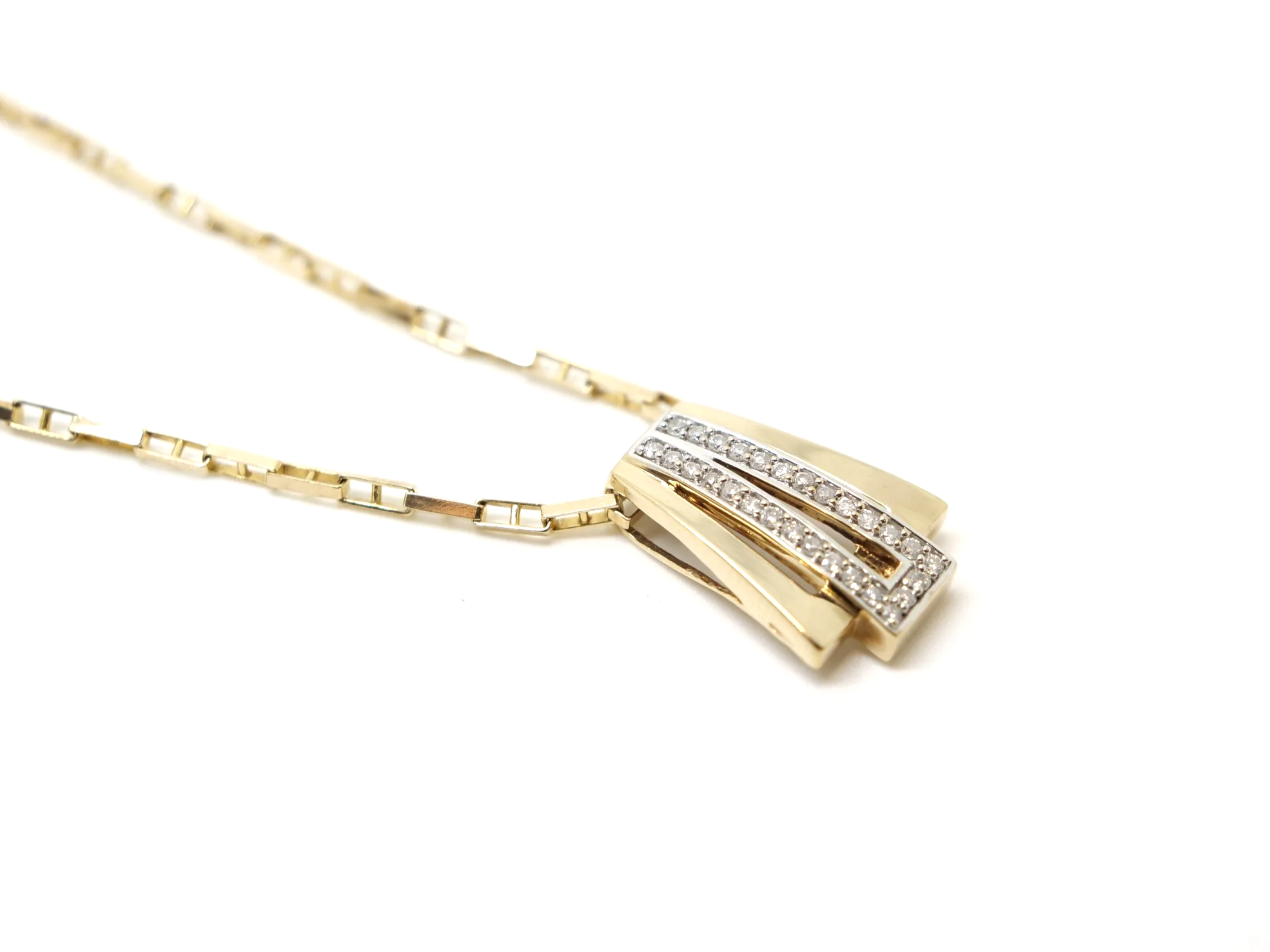 9ct gold diamond pendant necklace with a geometric Art Deco-style design, set with approximately 0.28ct of diamonds.
