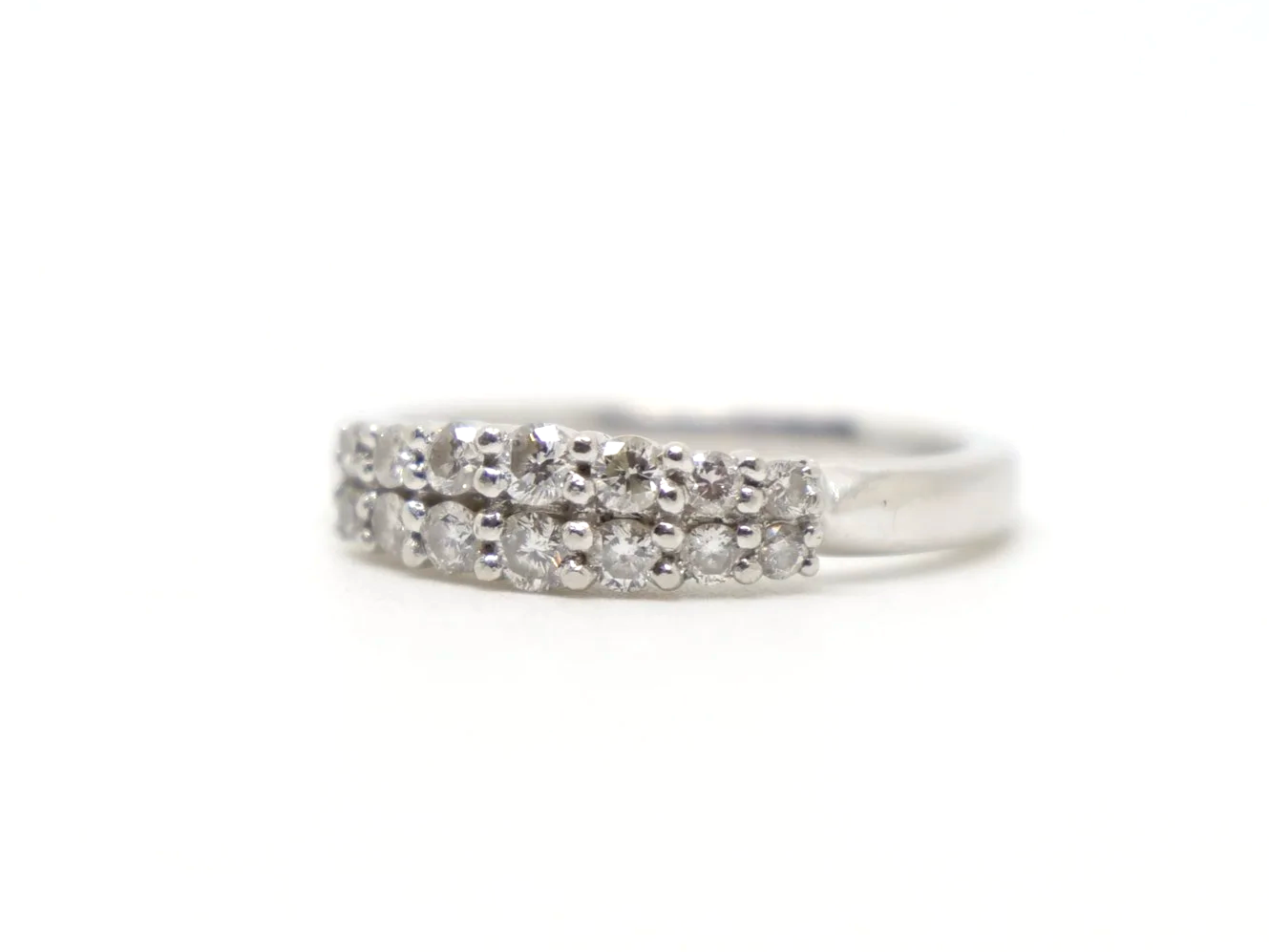 Lovely 18ct gold diamond half eternity ring, set with two rows of graduated diamonds. Approximately 0.34ct diamonds total.