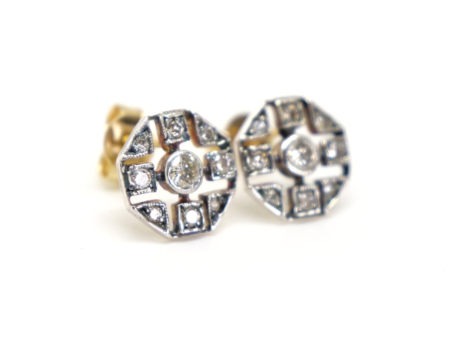 Vintage 18ct gold diamond earrings in an unusual hexagonal shape and set with approximately 0.5ct diamonds.