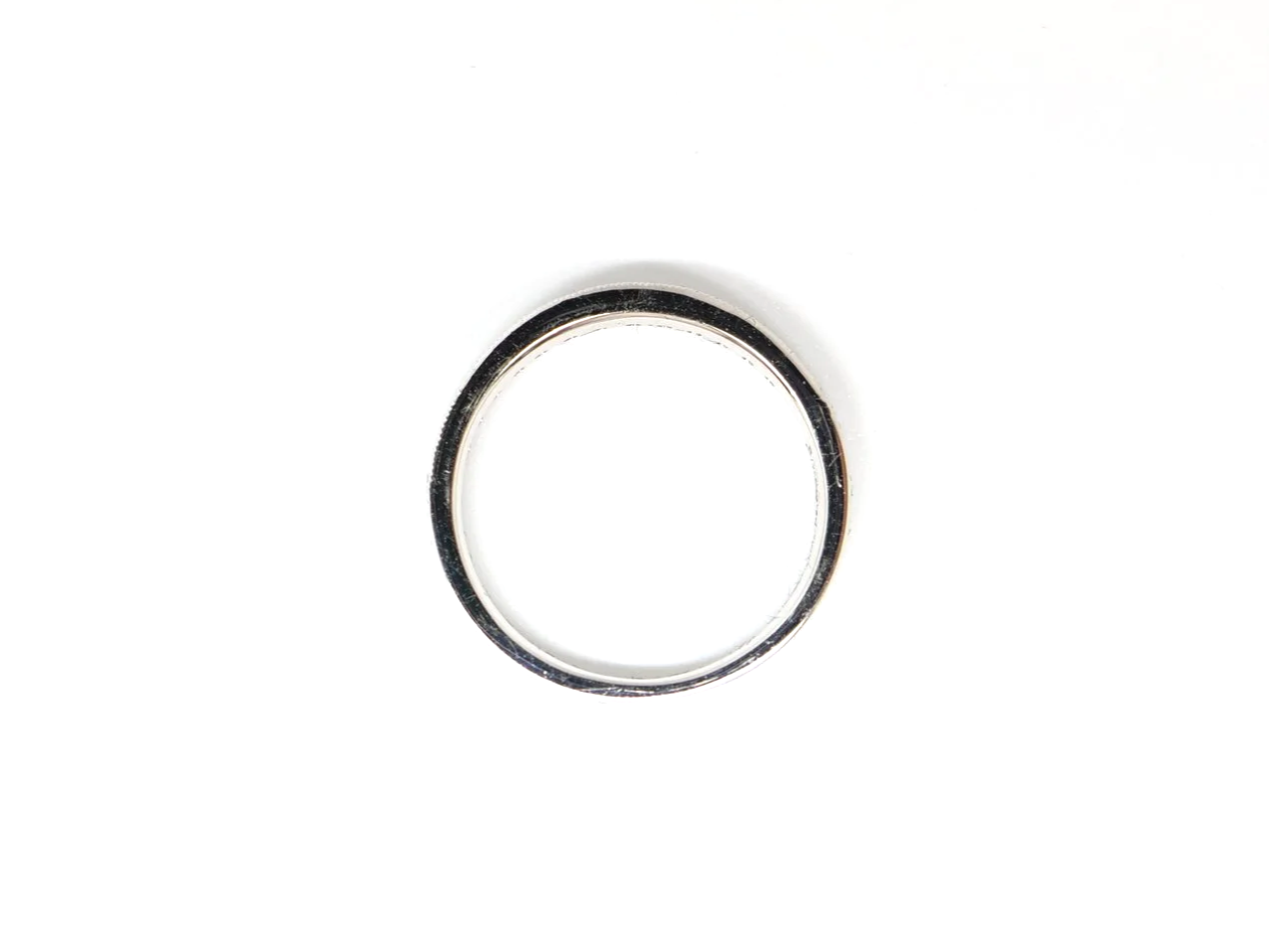 pretty platinum diamond half-eternity ring set with round brilliant-cut diamonds