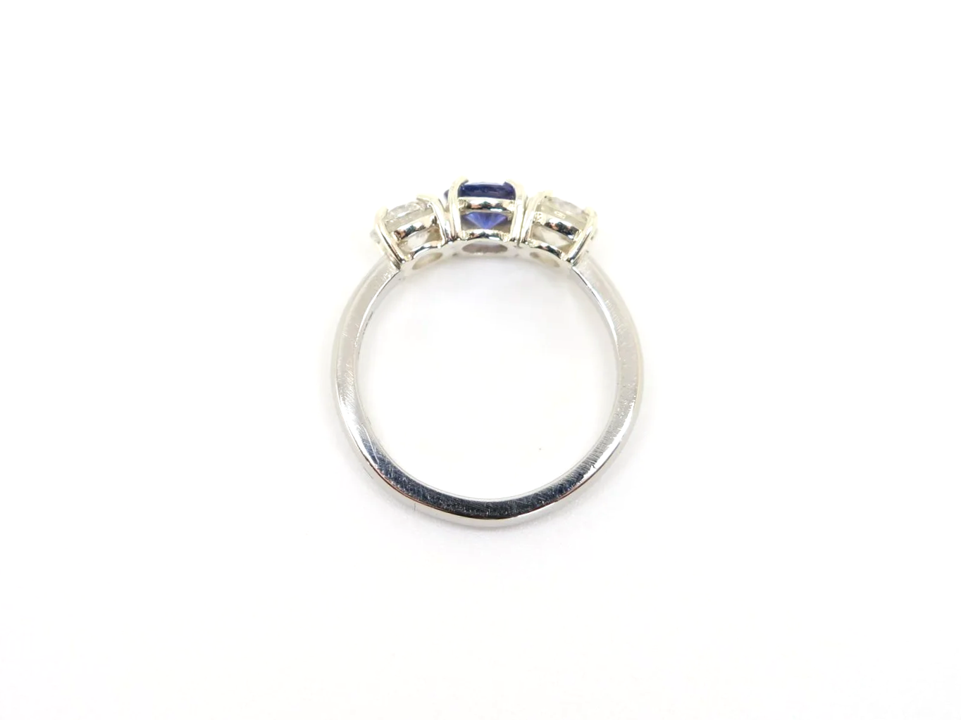 Platinum sapphire and diamond three stone ring, round cut sapphire centre 1.8ct