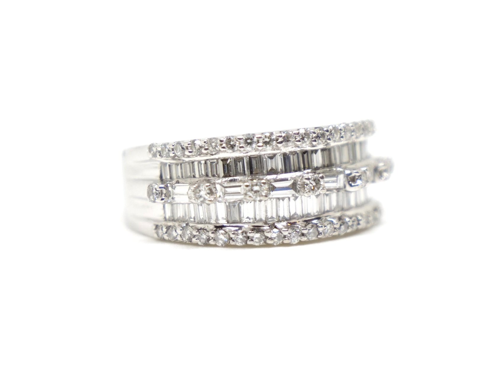 Contemporary 18ct gold diamond statement ring, set with a mixture of both brilliant and baguette cut diamonds. 1.88cts of diamonds.