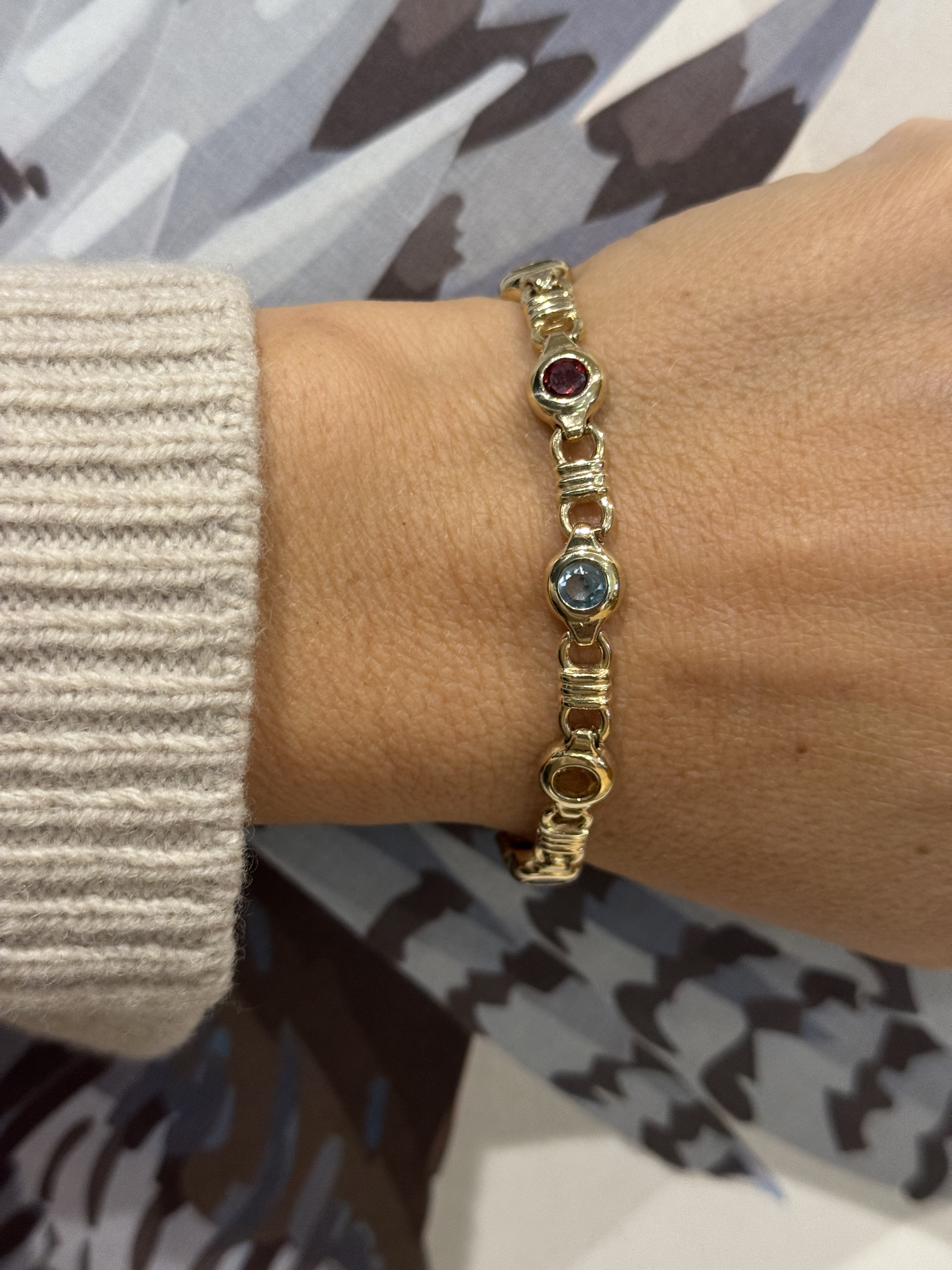 9ct gold bracelet with bezel-set amethyst, citrine, peridot, topaz and garnet gemstones