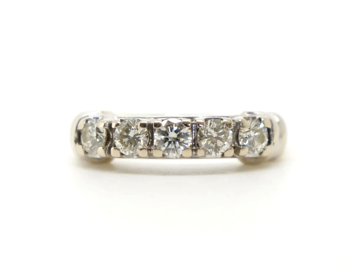 Unusual vintage 18ct gold diamond five stone ring, with five very sparkly brilliant cut diamonds in a scalloped setting.